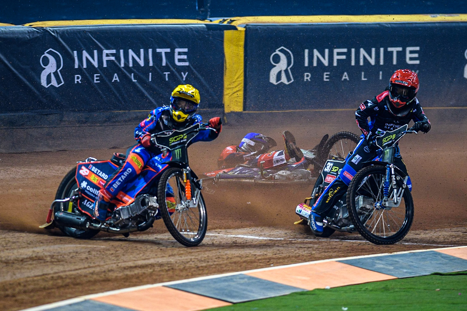 Steve Worrall (16) is a faller behind Leon Madsen (30) (Red)and Andzejs Lebedevs (29) (Yellow)during the FIM Speedway Grand Prix of Great Britain at the Principality Stadium, Cardiff on Saturday 2nd September 2023. (Photo: Ian Charles | MI News)