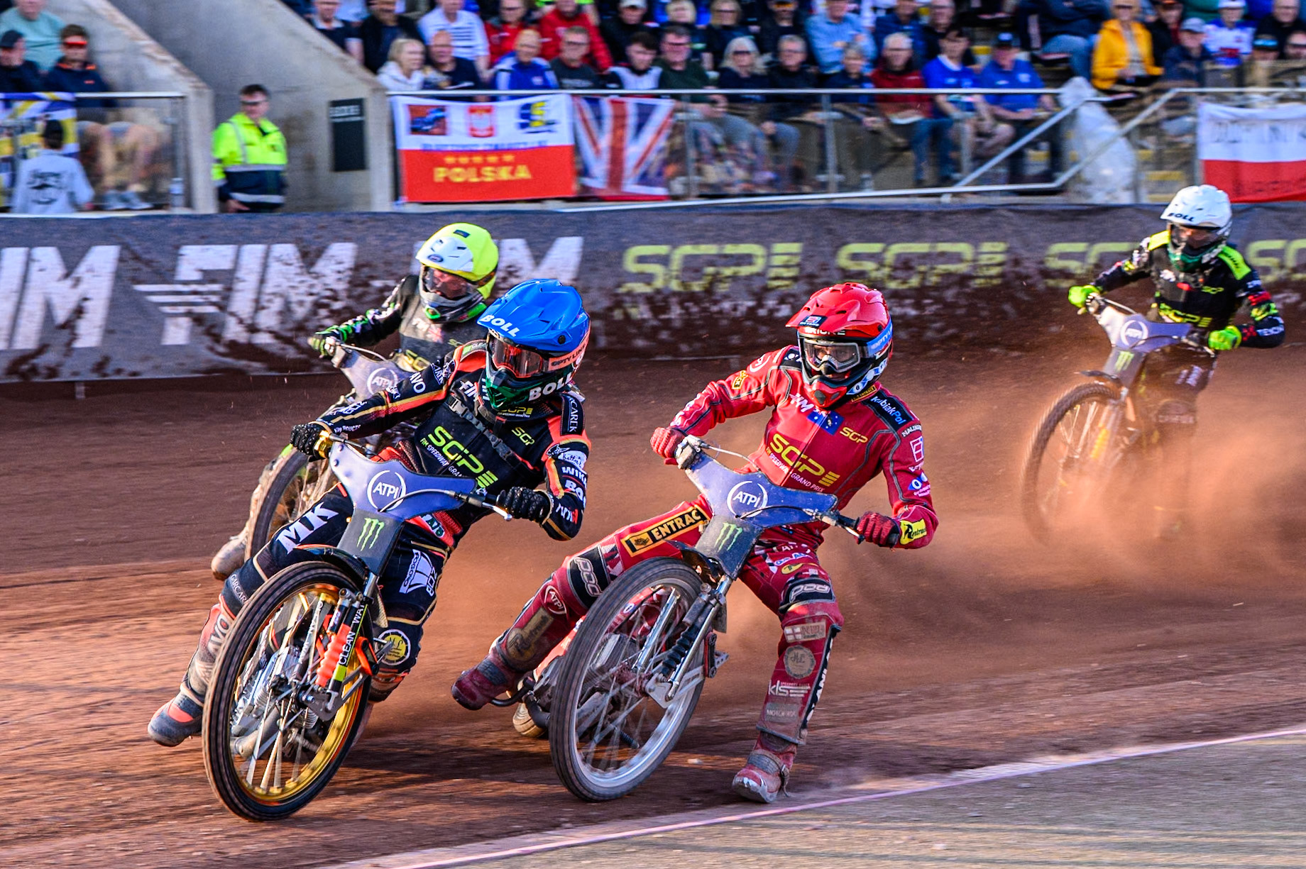 Mikkel Michelsen (155) of Denmark in Blue leading Max Fricke (46) of Australia in Red Wild Card Charles Wright (16) of Great Britain in Yellow and Martin Vaculik (54) of Slovakia in White during the ATPI FIM Speedway Grand Prix Round 5 at the National Speedway Stadium, Manchester, on Saturday 14th June 2025. (Photo: Ian Charles | MI News)
