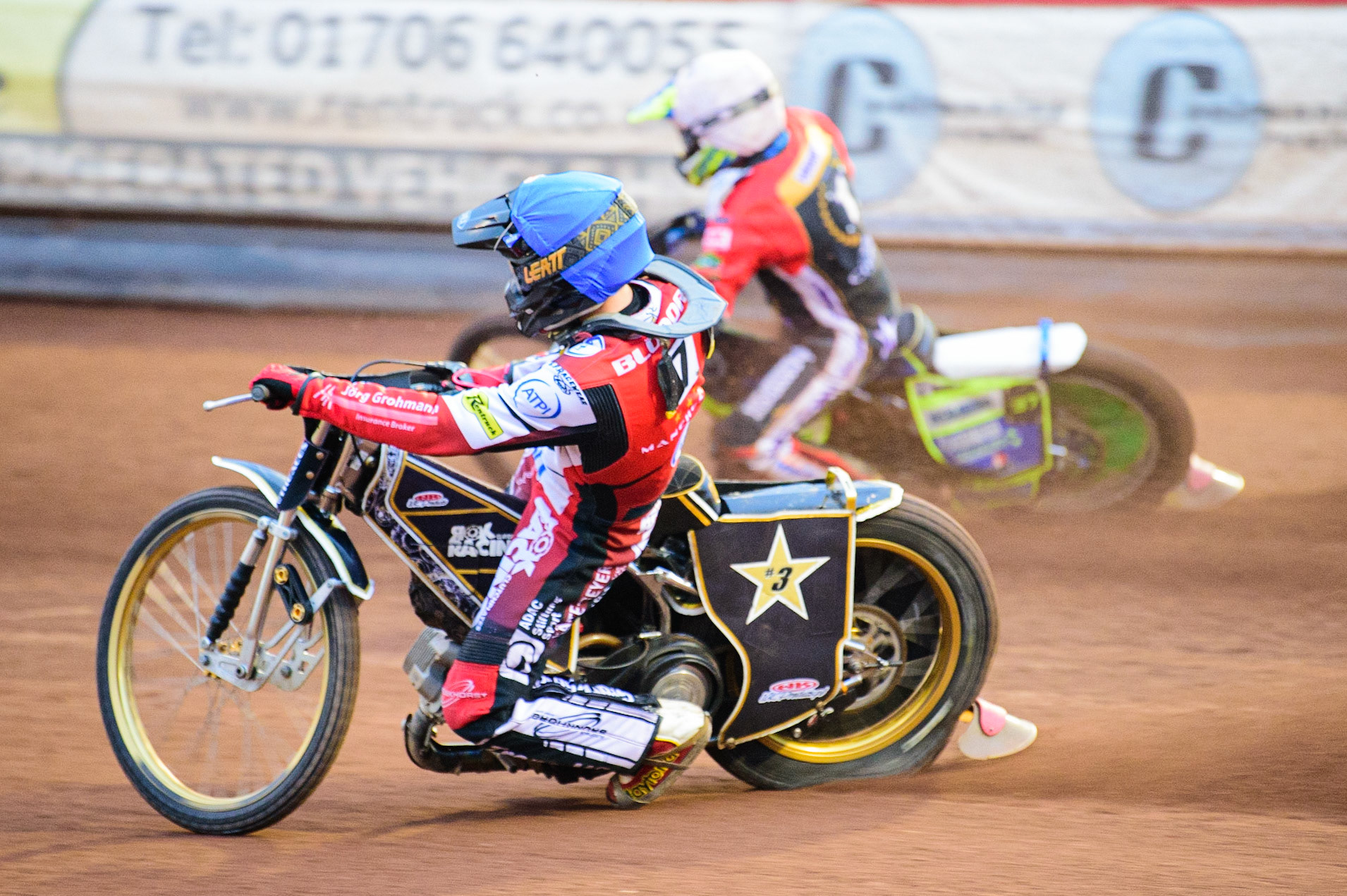 Norick Blödorn  (Blue) inside Chris Harris (White) during the SGB Premiership match between Belle Vue Aces and Peterborough at the National Speedway Stadium, Manchester on Monday 25th July 2022. (Credit: Ian Charles | MI News
