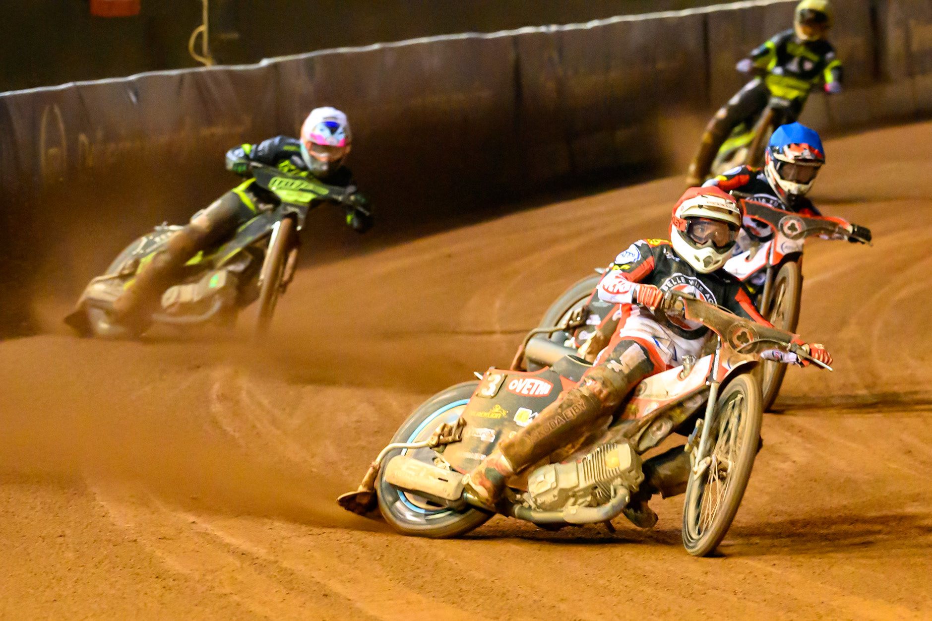 Peter Kildemand of Belle Vue Aces in Red  and Zach Cook of Belle Vue Aces in Blue  leading  Richard Lawson of Ipswich Witches in White  and Scott Nichols of Ipswich Witches in Yellow during the Rowe Motor Oil Premiership Play Off Semi Final 2nd leg match between Belle Vue Aces and Ipswich Witches at the National Speedway Stadium, Manchester on Monday 28th September 2026. (Photo: Ian Charles | MI News)