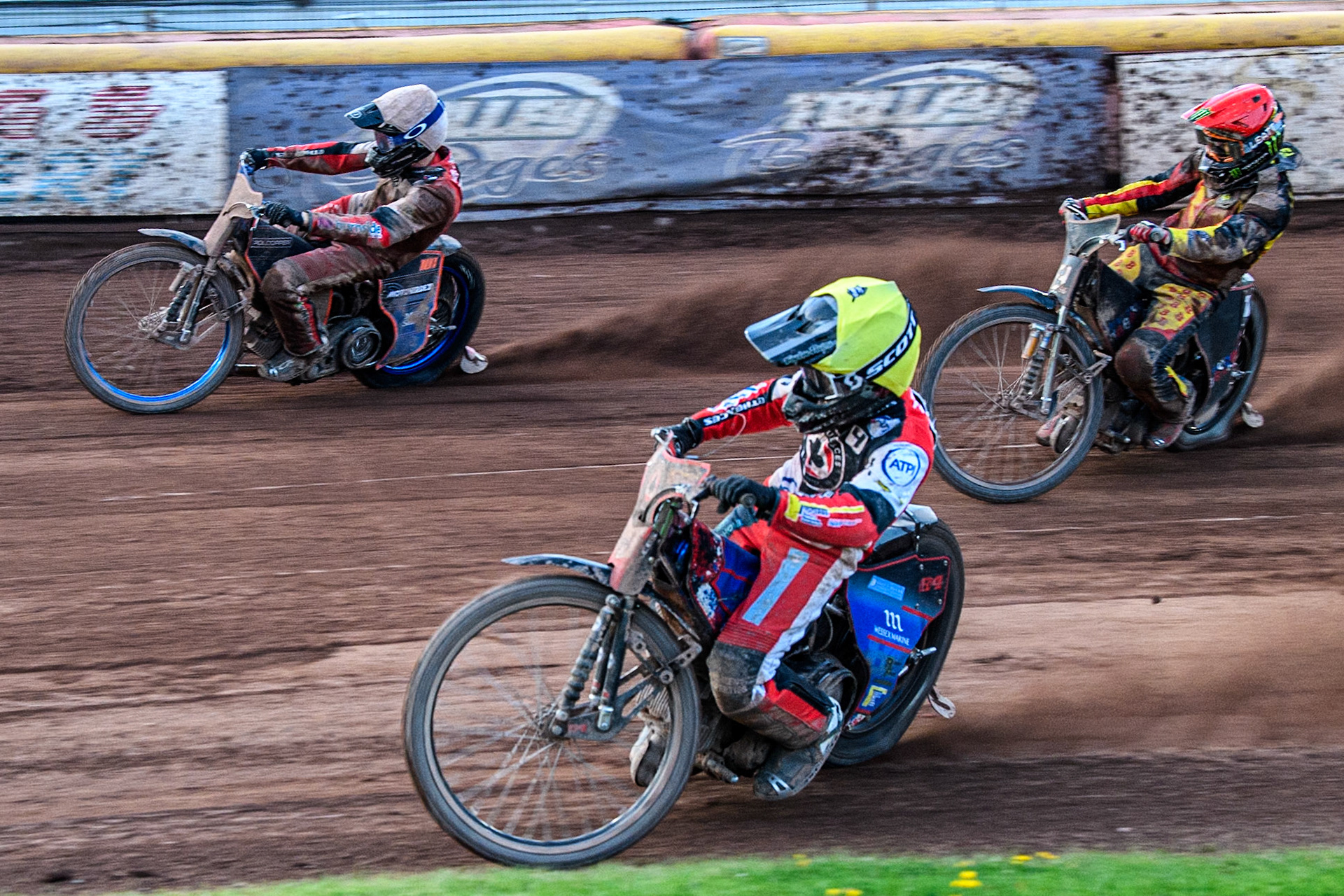 Belle Vue Aces' Ben Cook in Yellow rides inside Belle Vue Aces' Brady Kurtz in White and Birmingham Brummies' Freddie Lindgren in Red during the Rowe Motor Oil Premiership match between Birmingham Brummies and Belle Vue Aces at Perry Bar Stadium, Birmingham on Monday 29th July 2024. (Photo: Ian Charles | MI News)
