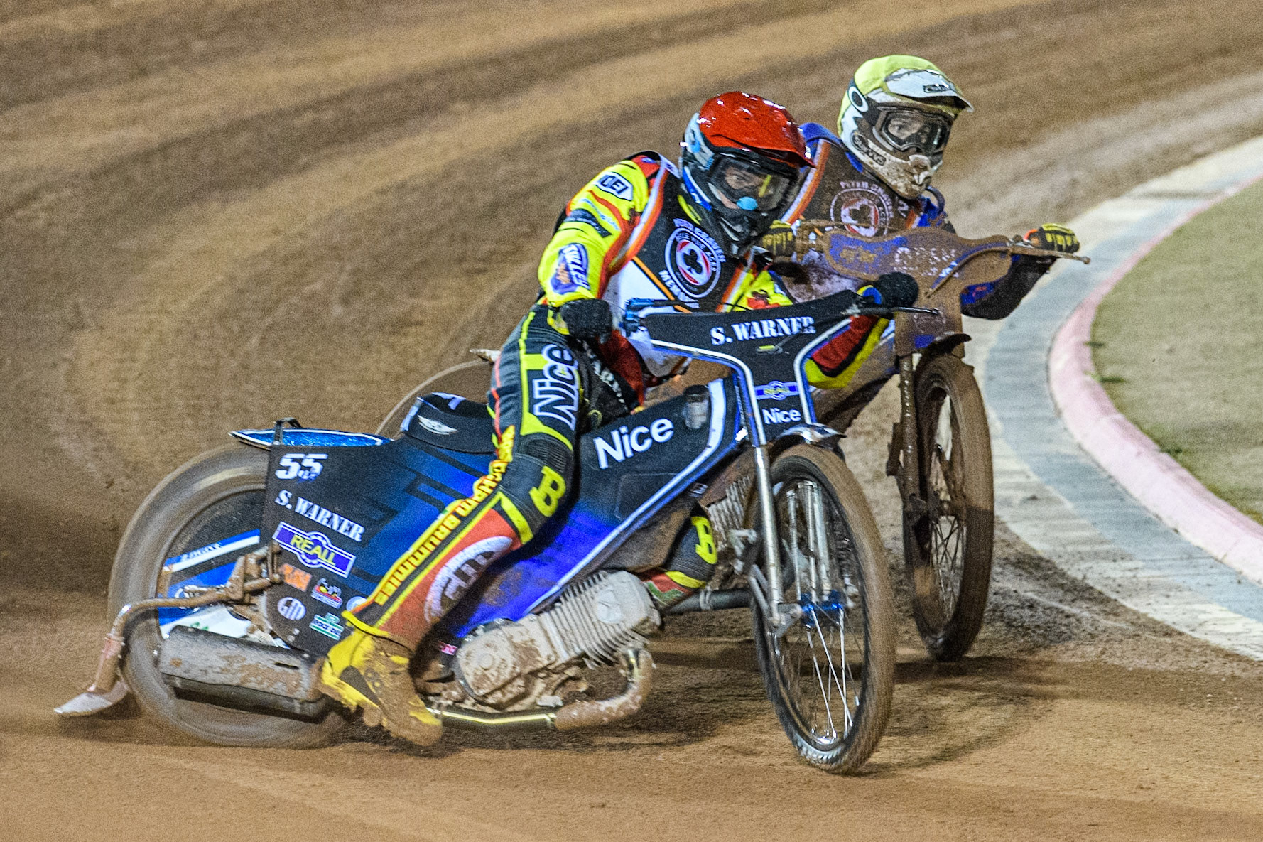 Matej Zagar rides outside Chris Harris during the Peter Craven Memorial Trophy at the National Speedway Stadium, Manchester on Monday 17th March 2025. (Photo: Ian Charles | MI News)
