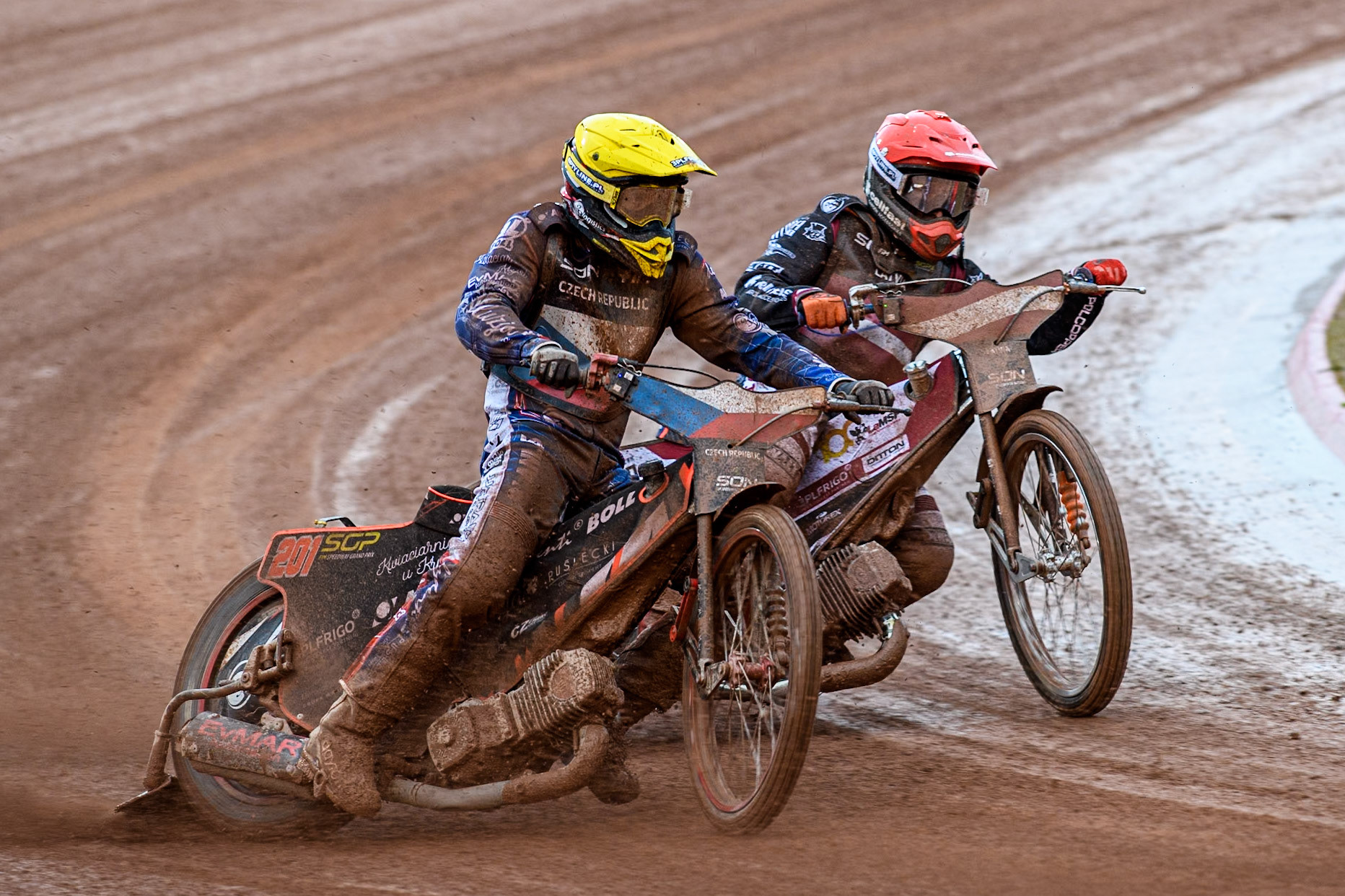 Jan Kvech of The Czech Republic in Yellow rides outside Andzejs Lebedevs of Latvia in Red during the Monster Energy FIM Speedway of Nation Semi Final 2 at the National Speedway Stadium, Manchester on Wednesday 10th July 2024. (Photo: Ian Charles | MI News)