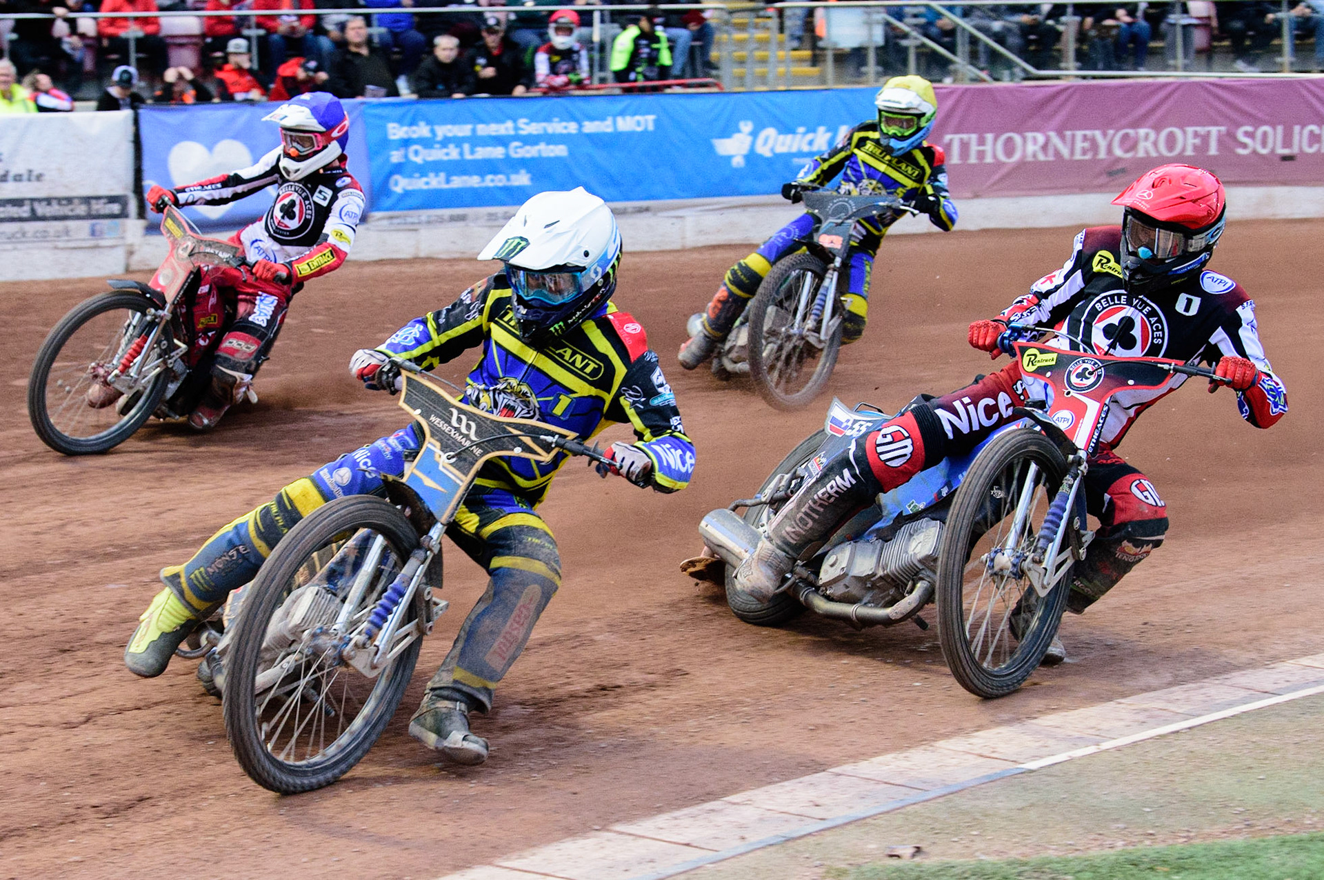 MANCHESTER, UK. JUL 5TH  Jack Holder  (White) leads Matej Zagar  (Red) and Max Fricke  (Blue) with Adam Ellis  (Yellow) behind  during the SGB Premiership match between Belle Vue Aces and Sheffield Tigers at the National Speedway Stadium, Manchester on Tuesday 5th July 2022. (Credit: Ian Charles | MI News)