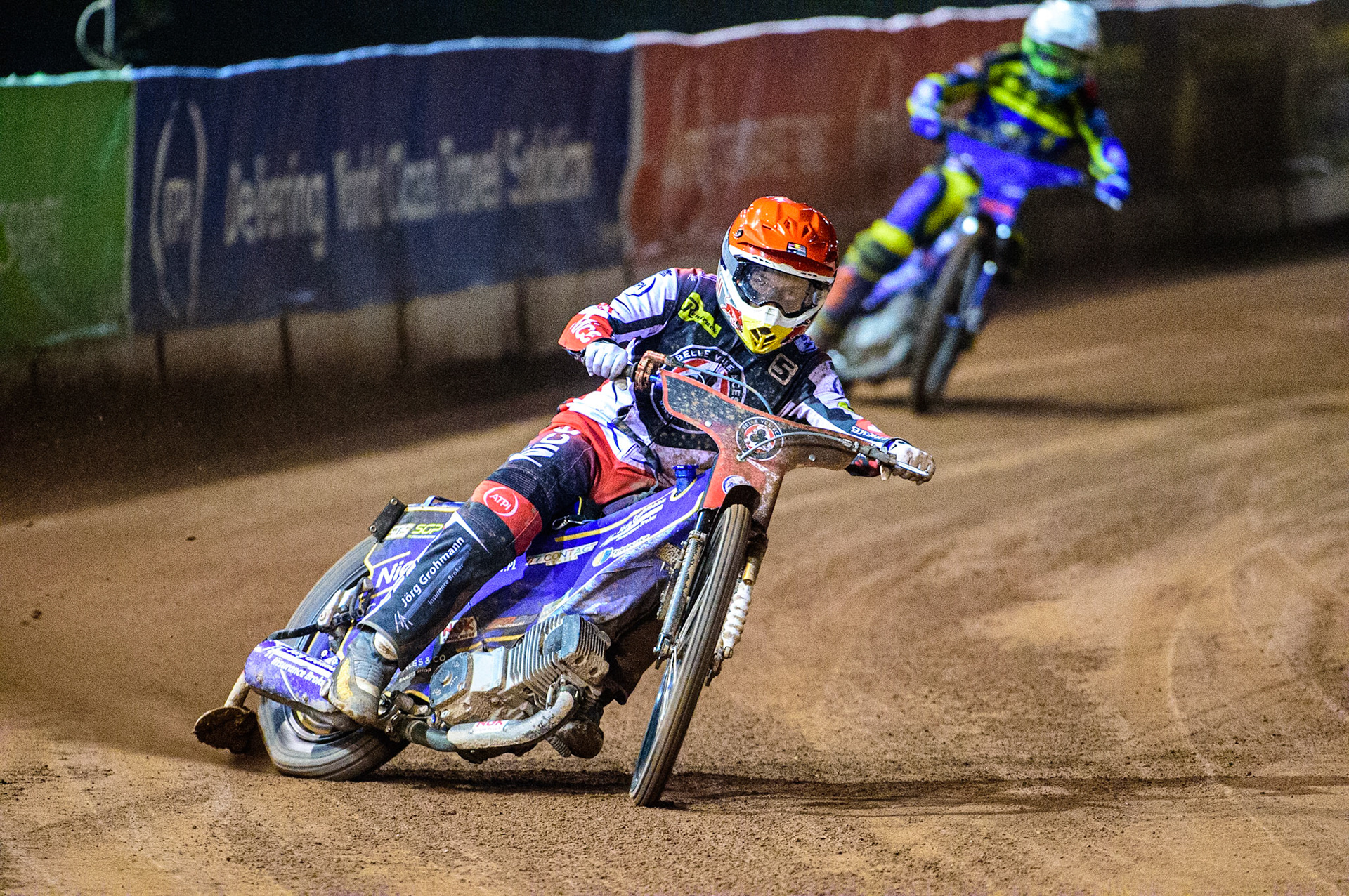 Robert Lambert  (Red) leads Adam Ellis  (White) during the SGB Premiership Grand Final 1st leg between Belle Vue Aces and Sheffield Tigers at the National Speedway Stadium, Manchester on Monday 10th October 2022. (Credit: Ian Charles | MI News)