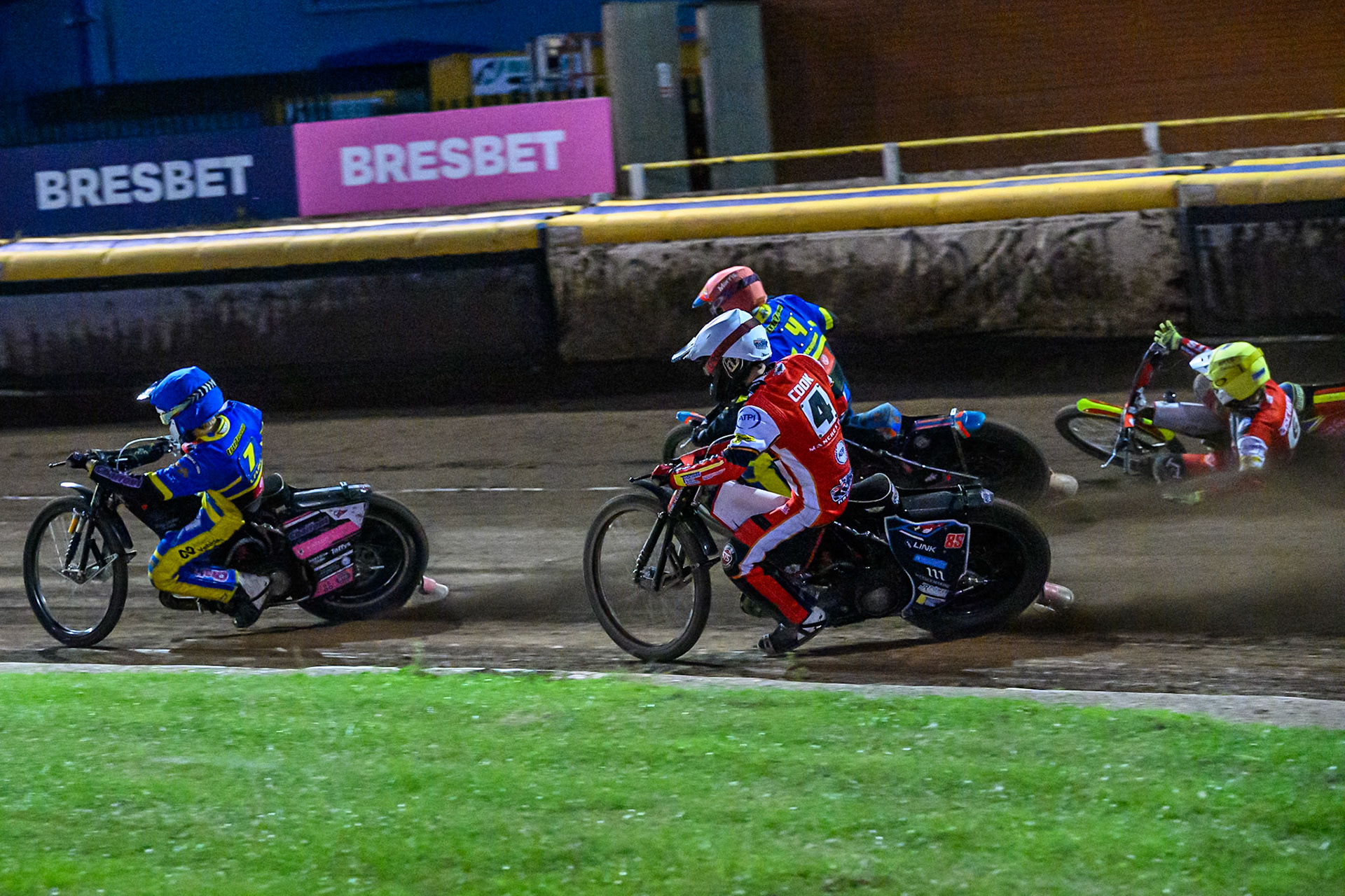 Leon Flint of Sheffield Tigers  in Blue leading Zach Cook of Belle Vue Aces   in White and Nick Morris of Sheffield Tigers  in Red as Tate Zischke of Belle Vue Aces   in Yellow fallsduring the Rowe Motor Oil Premiership match between Sheffield Tigers and Belle Vue Aces at Owlerton Stadium, Sheffield on Monday 11th August 2025. (Photo: Ian Charles | MI News)