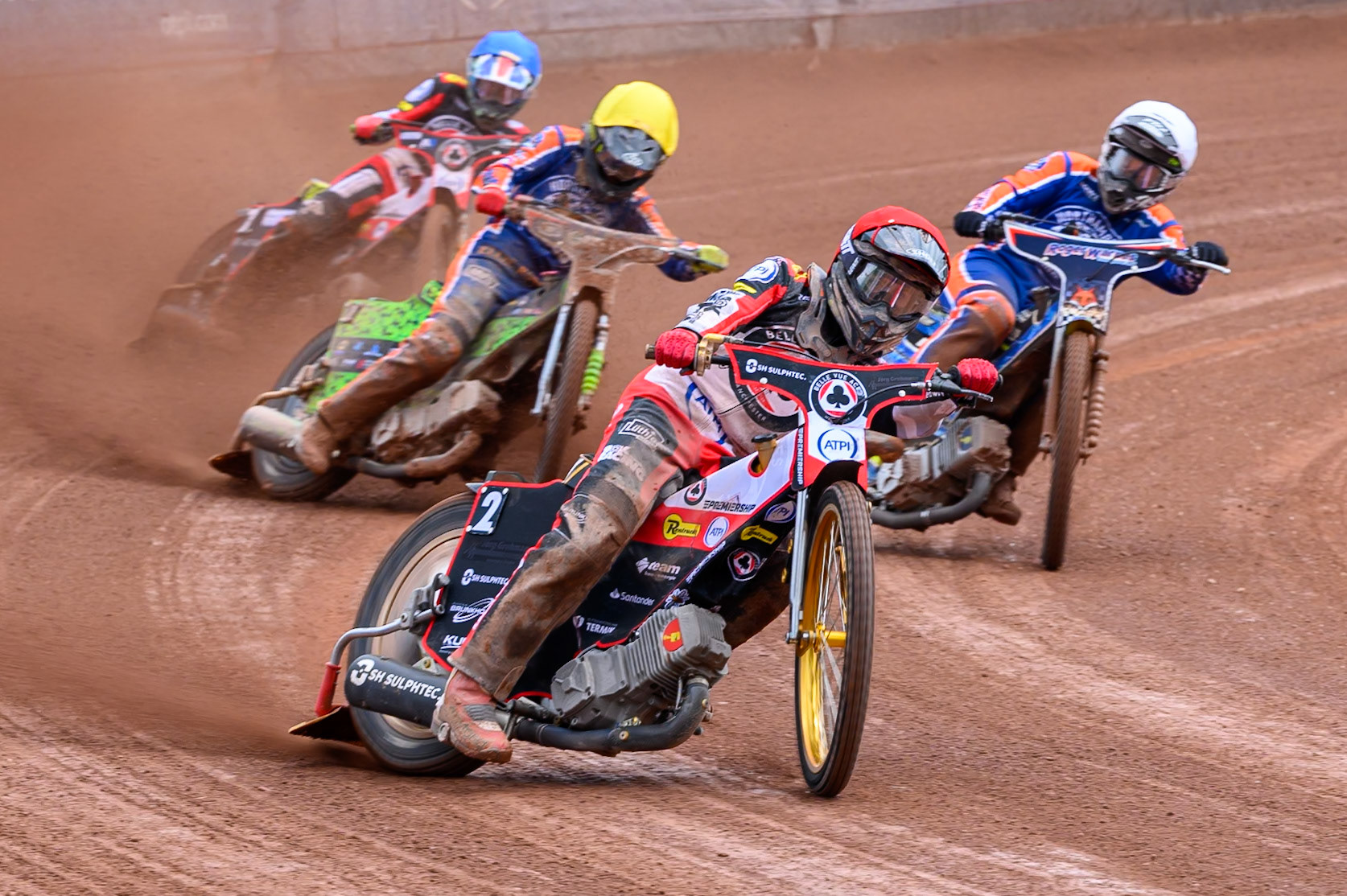 Norick Blödorn of Belle Vue Aces in Red leading Troy Batchelor of Northampton Foxes in White Luke Harrison of Northampton Foxes  in Yellow and Will Cairns of Belle Vue Aces  in Blue during the Rowe Motor Oil Premiership match between Belle Vue Aces and Northampton Foxes at the National Speedway Stadium, Manchester on Monday 4th May 2026. (Photo: Ian Charles | MI News)