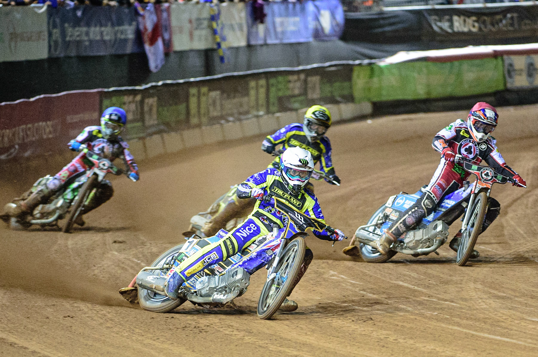 MANCHESTER, UK. OCT 7TH  Jack Holder  (White) leads Steve Worrall   (Red) Troy Batchelor  (Yellow) and Charles Wright  (Blue) during the SGB Premiership Play off Semi-Final Second Leg between Belle Vue Aces and Sheffield Tigers at the National Speedway Stadium, Manchester on Thursday 7th October 2021. (Credit: Ian Charles | MI News)