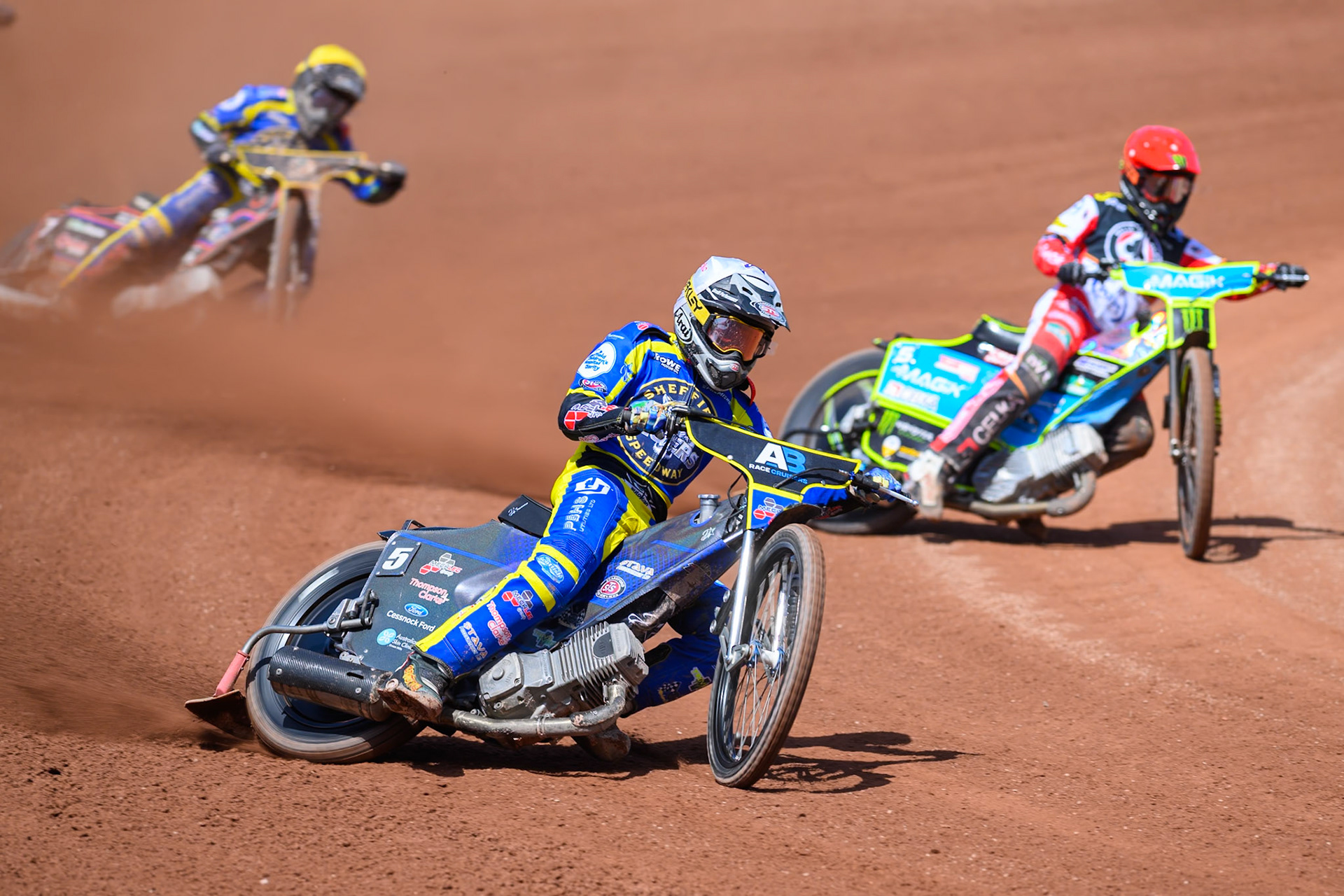 Josh Pickering of Sheffield Tigers in White leading Jaimon Lidsey, Guest Rider for Belle Vue Aces in Red during the Rowe Motor Oil Premiership match between Belle Vue Aces and Sheffield Tigers at the National Speedway Stadium, Manchester on Monday 25th May 2026. (Photo: Ian Charles | MI News)