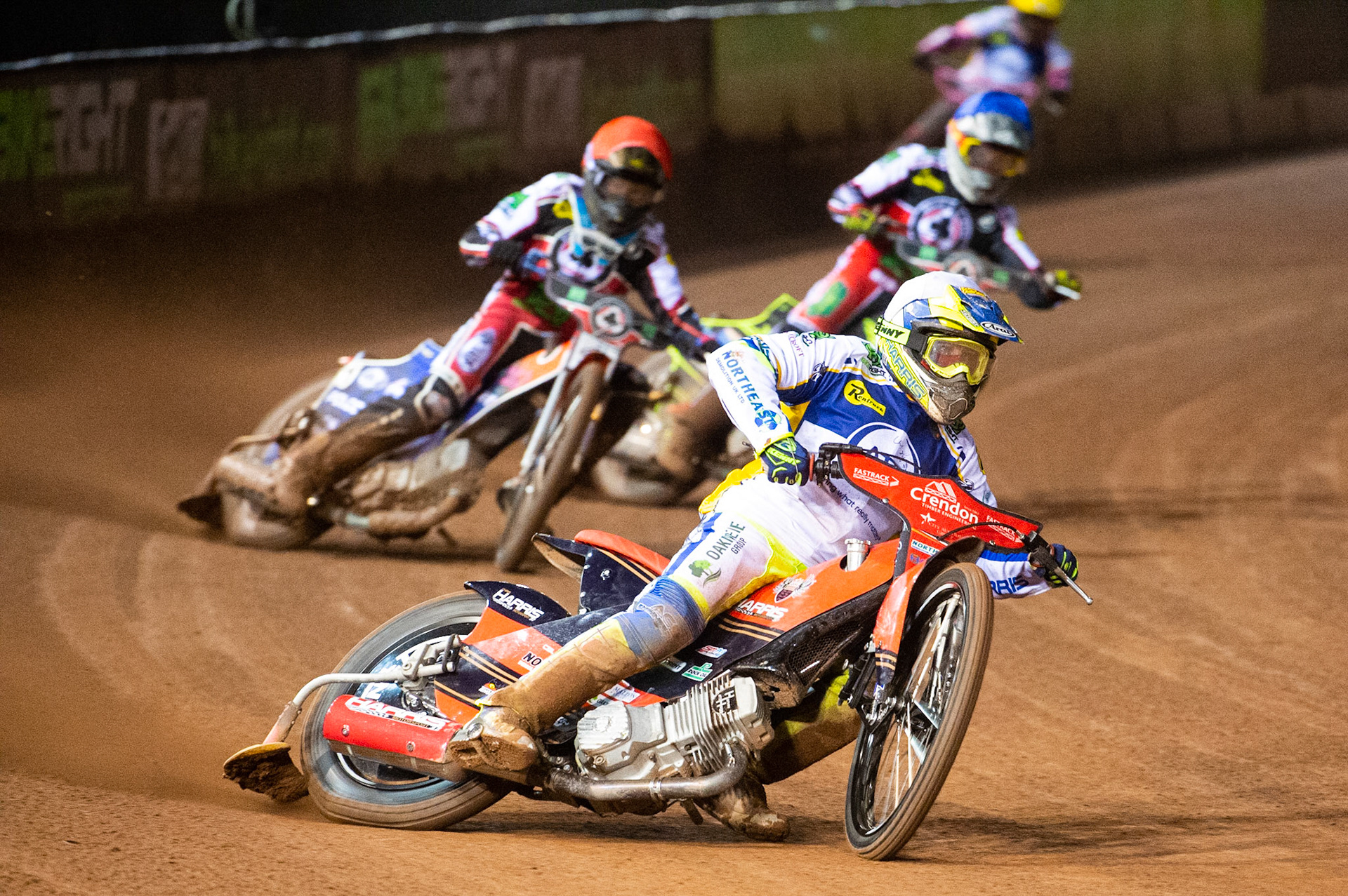 Photo: Ian CharlesChris Harris of the 'ATPI' All Stars (White) leads Brady Kurtz of Belle Vue 'BikeRight' Aces (Red)., Jye Etheridge of Belle Vue 'BikeRight' Aces (Blue) and Josh MacDonald of the 'ATPI' All StarsBelle Vue ‘Bikerite ’Aces v ‘ATPI’ All Stars, Premiership Challenge, National Speedway Stadium, Manchester Thursday  24  September  2020