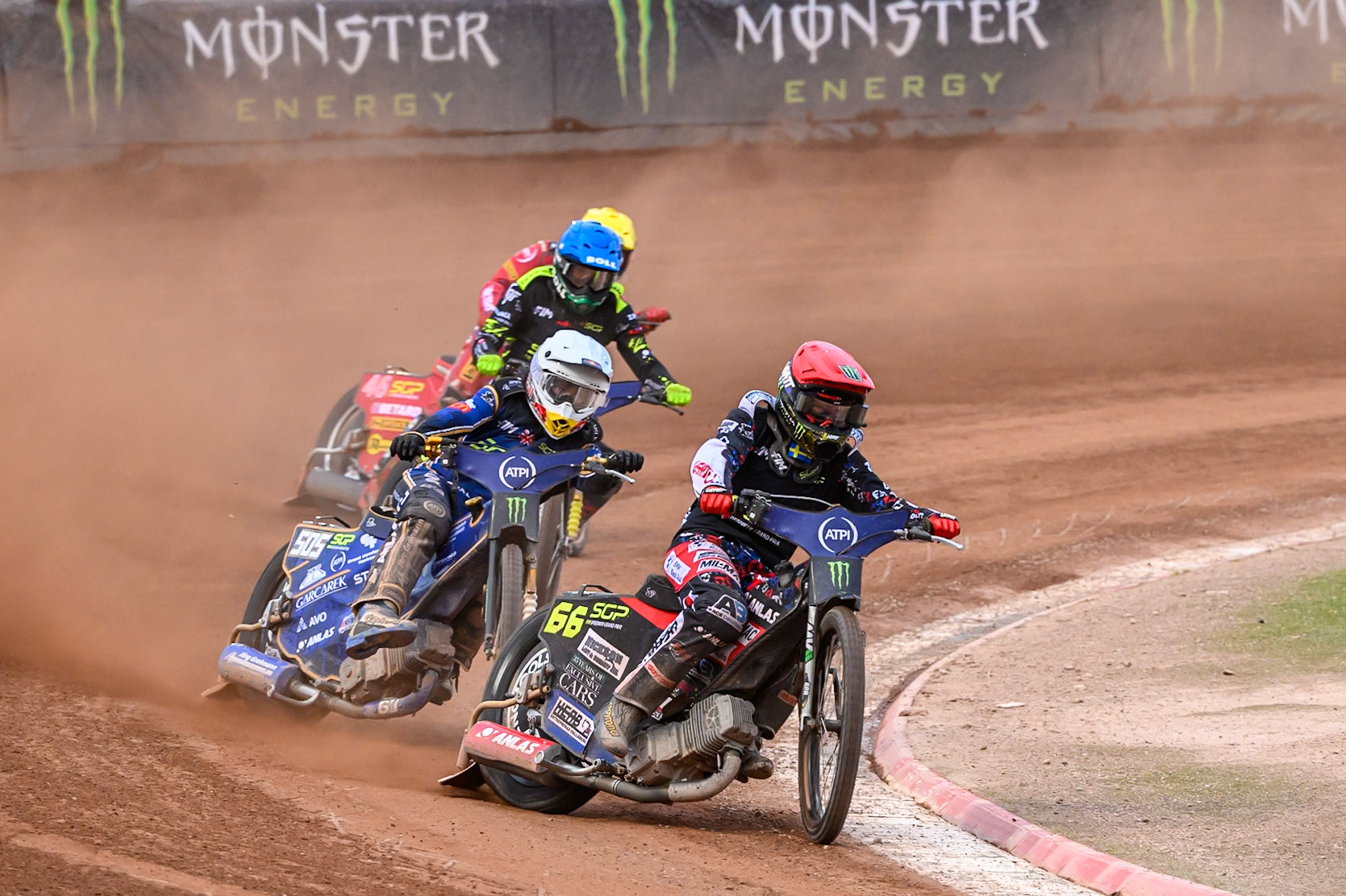 Fredrik Lindgren (66) of Sweden in Red leading Robert Lambert (505) of Great Britain in White, Martin Vaculik (54) of Slovakia in Blue and Max Fricke (46) of Australia in Yellow during the ATPI FIM Speedway Grand Prix Round 4 at the National Speedway Stadium, Manchester, on Friday 13th June 2025. (Photo: Ian Charles | MI News)