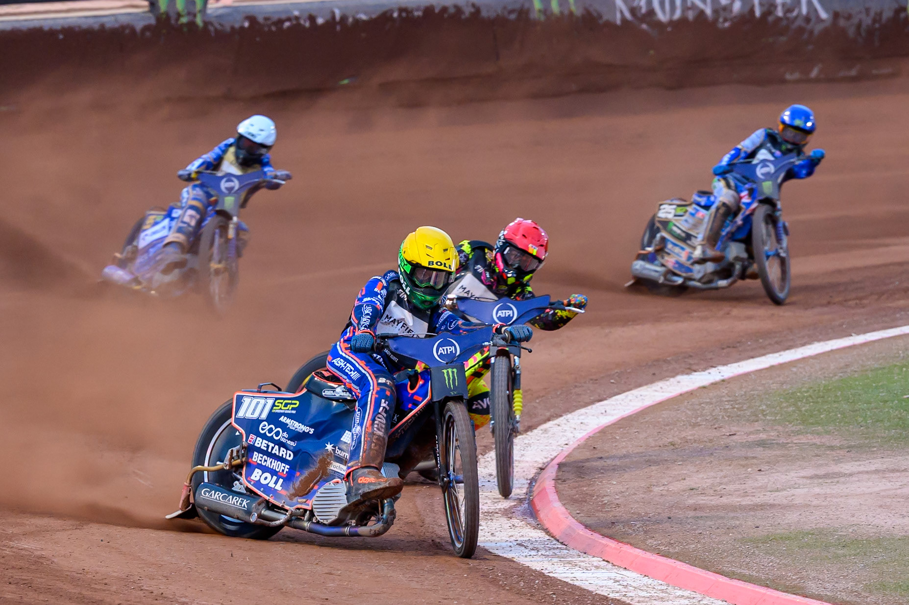 On the last turn of the Final, Brady Kurtz (101) of Australia in Yellow leads Michael Jepsen Jensen (52) of Denmark in Red, Bartosz Zmarzlik (95) of Poland in White and Jack Holder (25) of Australia in Blue to win during the ATPI  FIM Speedway GP of Manchester at the National Speedway Stadium, Manchester on Saturday 6th June 2026. (Photo: Ian Charles | MI News)