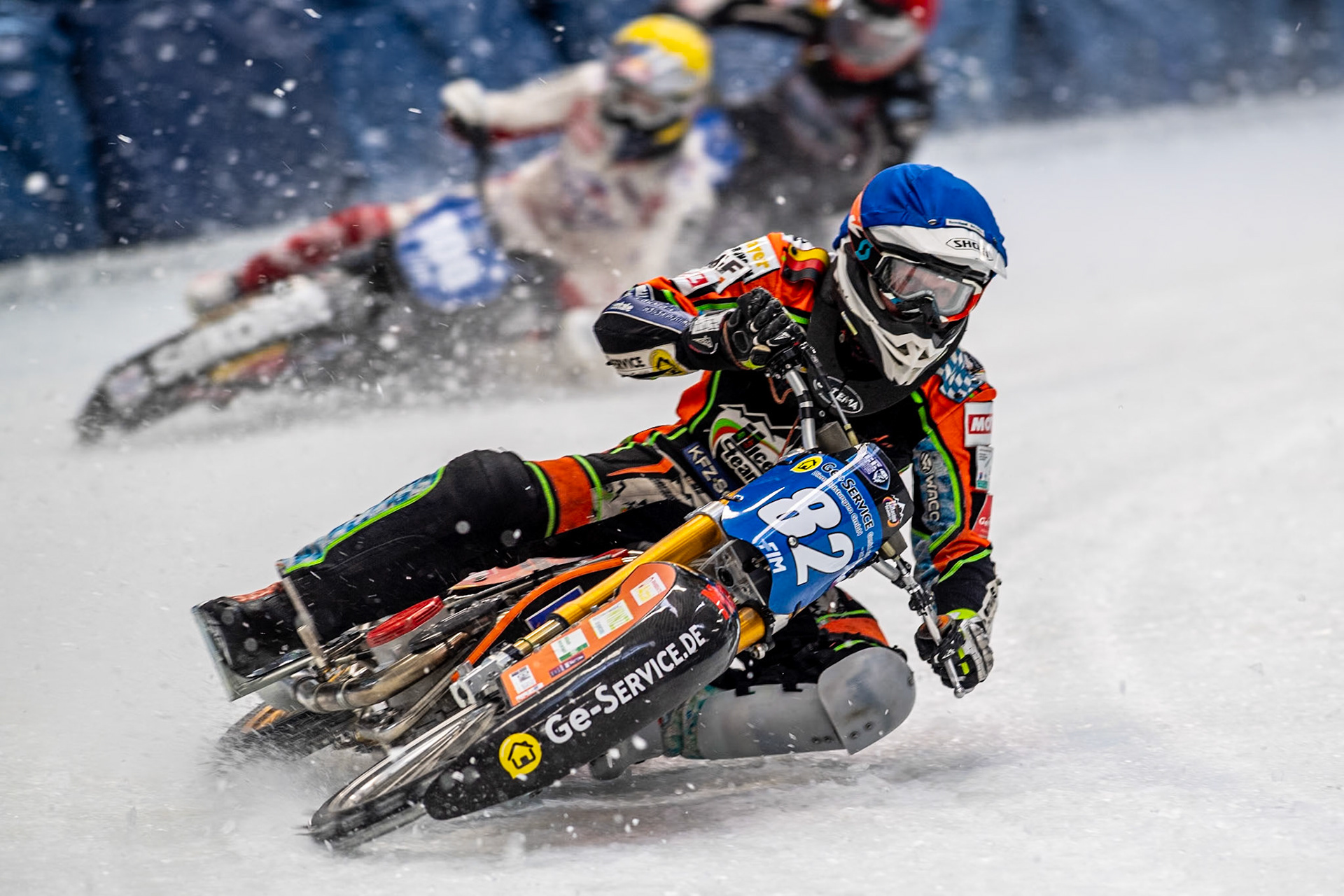 Germany's Markus Jell (82) (Blue) leads  Austria's Franz Zorn (100) (Yellow) during the FIM Ice Speedway Gladiators World Championship Final 2 at the Max-Aicher-Arena, Inzell on Sunday 24 March 2024. (Photo: Ian Charles | MI News)