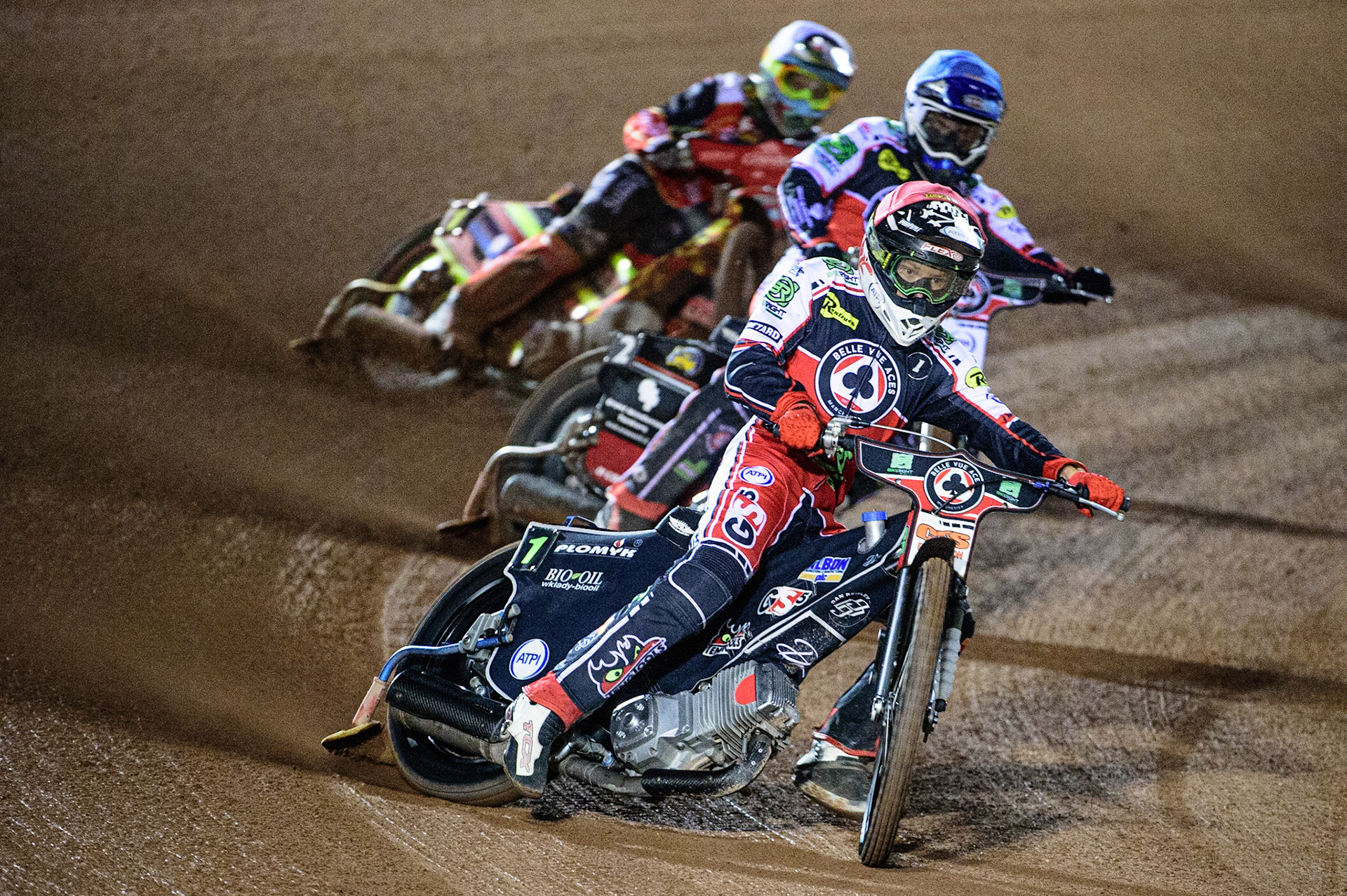 MANCHESTER, UK. OCT 11TH  Dan Bewley (Red) and Richie Worrall (Blue)  lead Michael Palm Toft  (White) during the SGB Premiership Grand Final 1st Leg between Belle Vue Aces and Peterborough Panthers at the National Speedway Stadium, Manchester on Monday 11th October 2021. (Credit: Ian Charles | MI News)