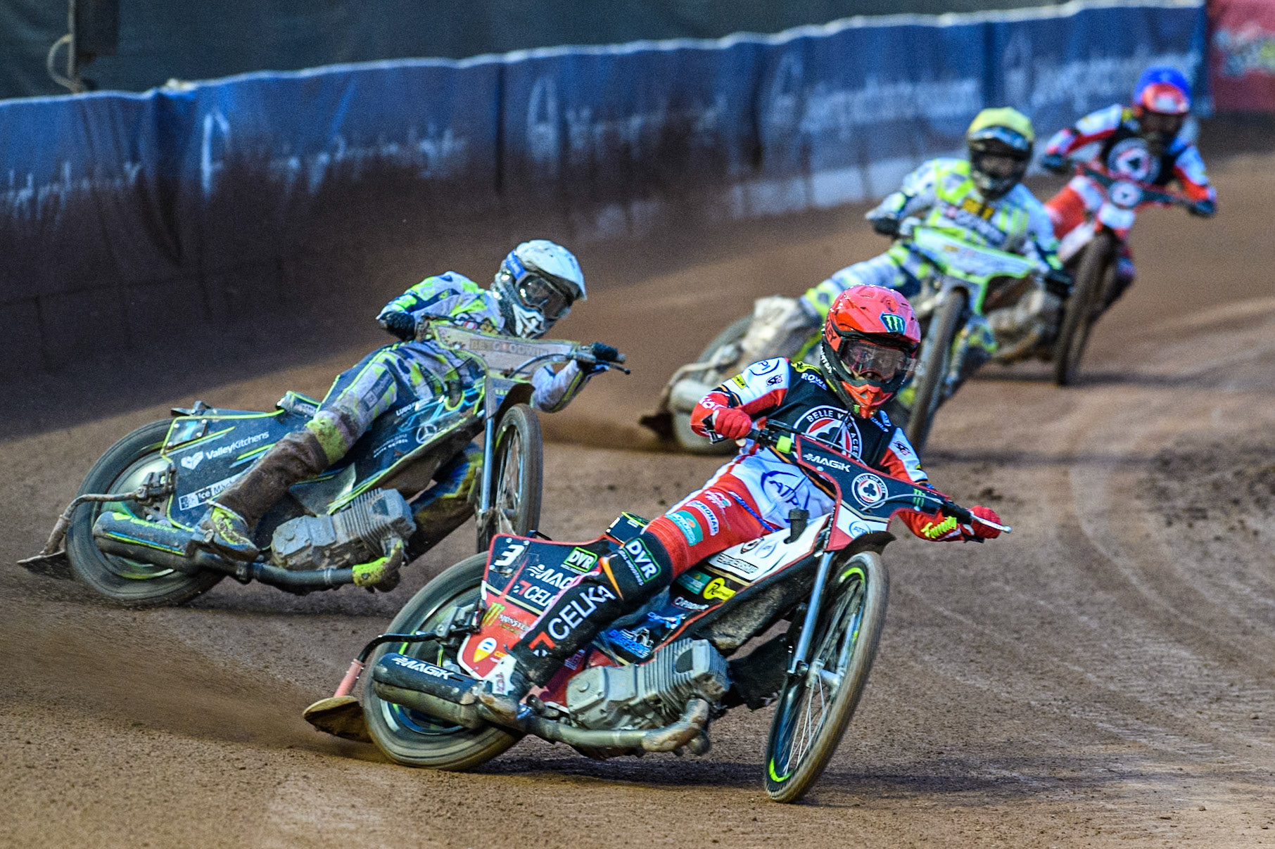Belle Vue Aces' Jaimon Lidsey in Red leading \Oxford Spires' Rohan Tungate in White Oxford Spires' Erik Riss in Yellow and Belle Vue Aces' Zack Cook in Blue during the Rowe Motor Oil Premiership match between Belle Vue Aces and Oxford Spires at the National Speedway Stadium, Manchester on Monday 14th April 2025. (Photo: Ian Charles | MI News)