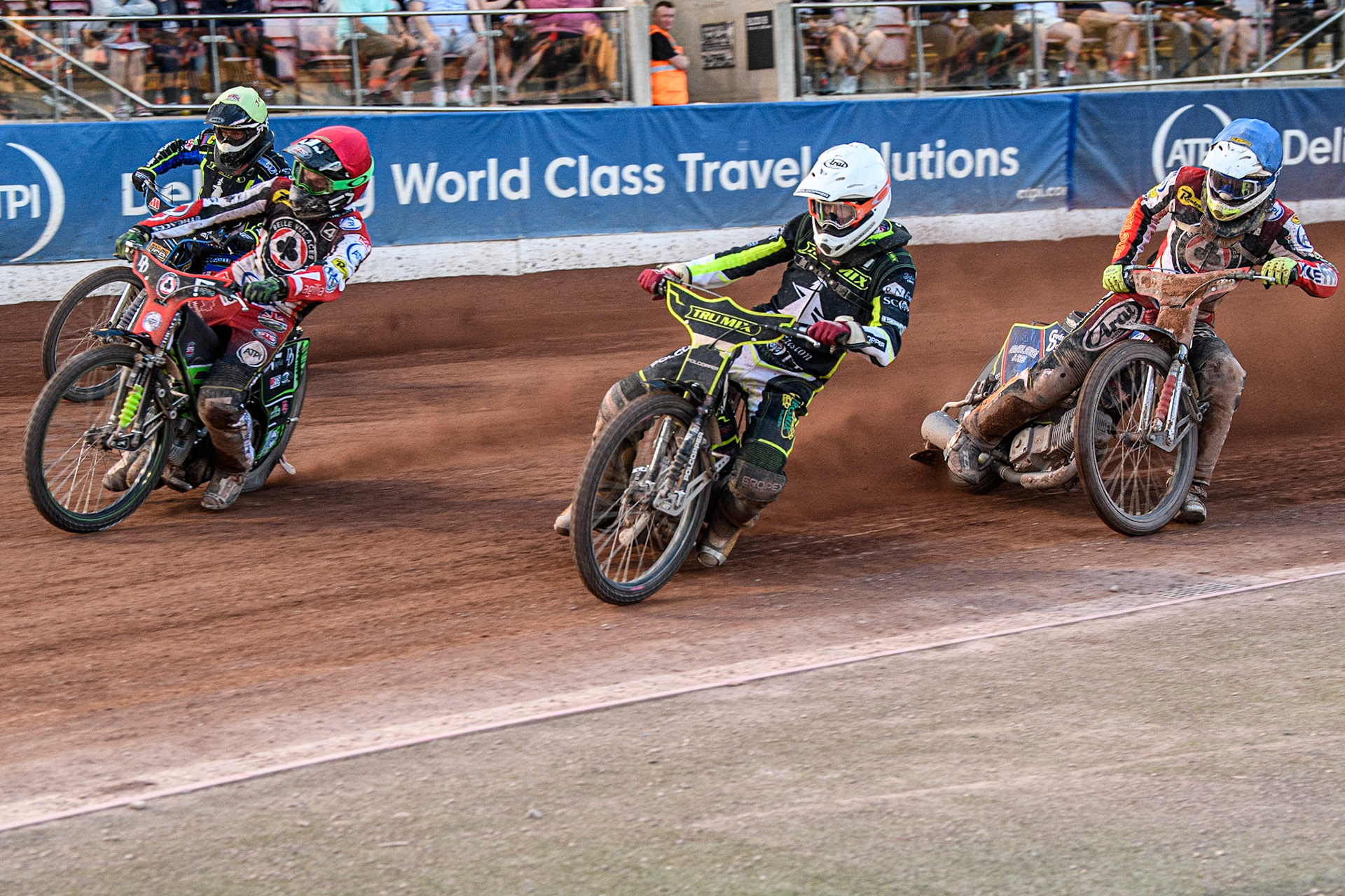 Keynan Rew (White) inside Charles Wright (Red) with Joe Thompson (Yellow) and Jake Mulford (Blue) behind during the Sports Insure Premiership match between Belle Vue Aces and Ipswich Witches at the National Speedway Stadium, Manchester on Monday 5th June 2023. (Photo: Ian Charles | MI News)