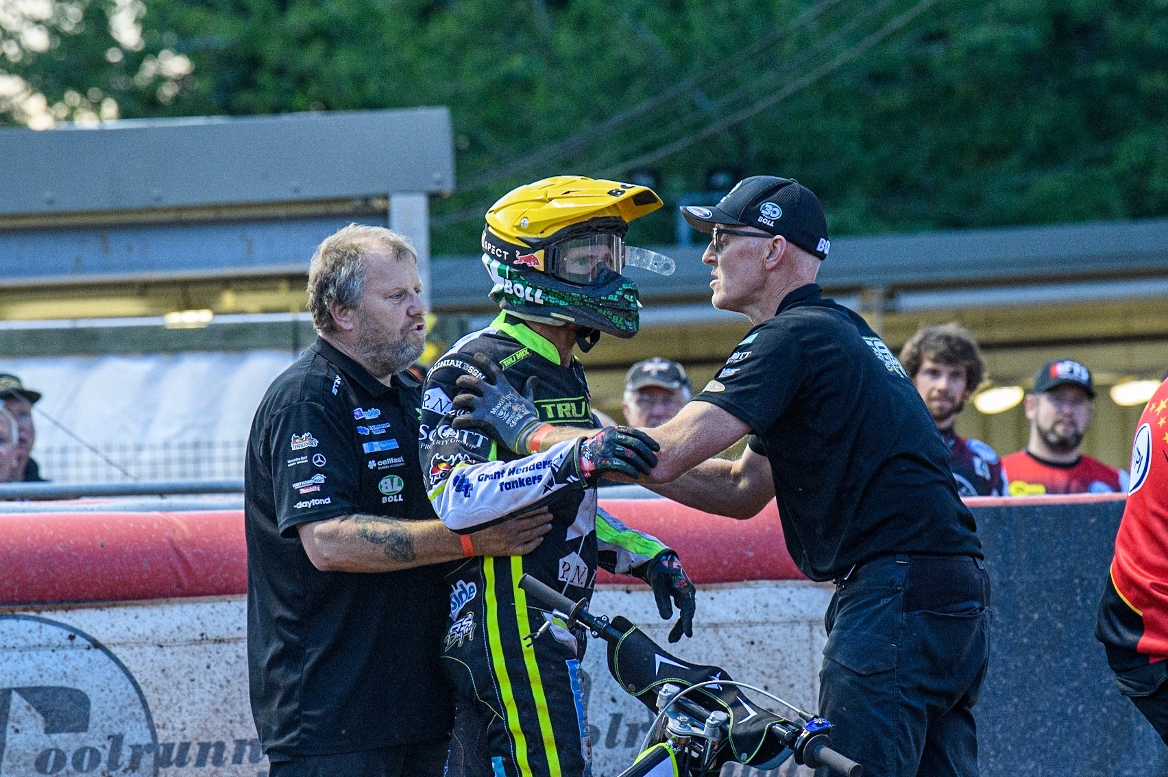 Jason Doyle is held back by his mechanics following an on track incident which upset him during the Sports Insure Premiership match between Belle Vue Aces and Ipswich Witches at the National Speedway Stadium, Manchester on Monday 17th July 2023. (Photo: Ian Charles | MI News)
