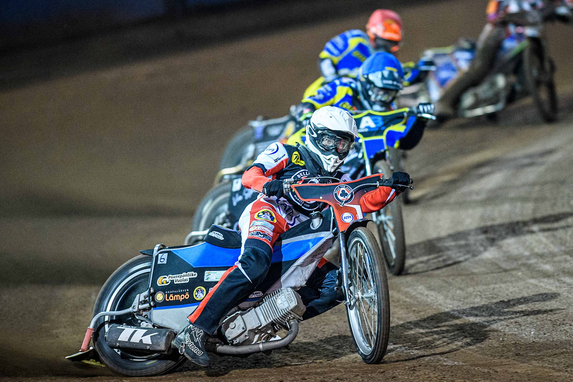 Belle Vue Aces' Antti Vuolas  in White leading Sheffield Tigers' Dan Gilkes  in Blue and Sheffield Tigers' Jason Edwards  in Red during the Rowe Motor Oil Premiership Play Off Semi Final 2nd leg between Sheffield Tigers and Belle Vue Aces at Owlerton Stadium, Sheffield on Thursday 19th September 2024. (Photo: Ian Charles | MI News)