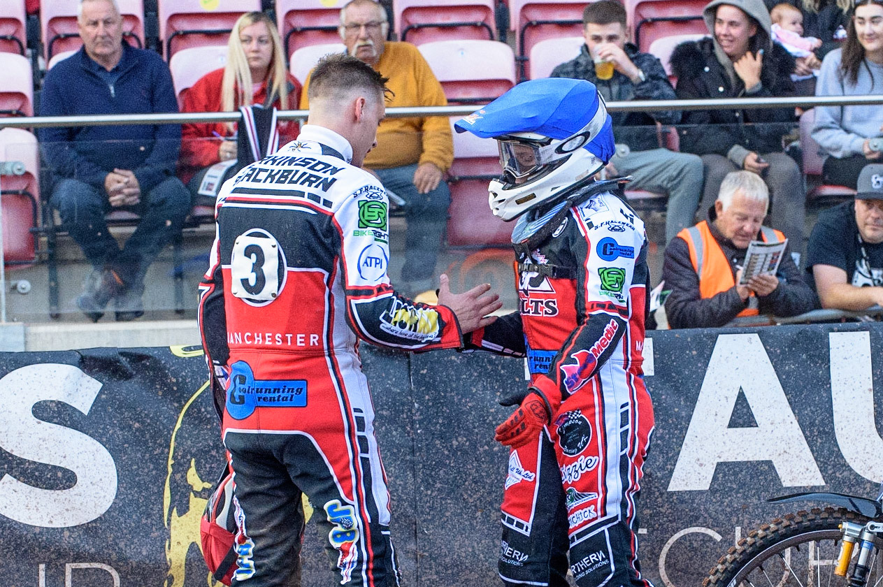 MANCHESTER, UK. JULY 29TH   Jack Parkinson-Blackburn  (left) congratulates Sam McGurk  on his heat win during the National Development League match between Belle Vue Colts and Leicester Lion Cubs at the National Speedway Stadium, Manchester on Thursday 29th July 2021. (Credit: Ian Charles | MI News)