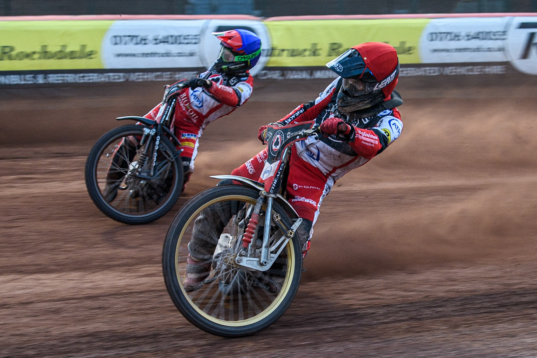 Belle Vue Aces' Norick Blodorn in Red rides inside team mate Belle Vue Aces' Dan Bewley in Blue during the Rowe Motor Oil Premiership match between Belle Vue Aces and Leicester Lions at the National Speedway Stadium, Manchester on Monday 24th June 2024. (Photo: Ian Charles | MI News)