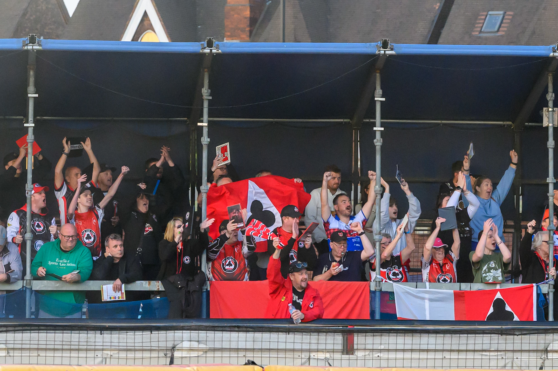 Belle Vue Aces fans celebrate the win in heat 12 during the Rowe Motor Oil Premiership match between Birmingham Brummies and Belle Vue Aces at Perry Barr Stadium, Birmingham on Monday 28th July 2025. (Photo: Ian Charles | MI News)
