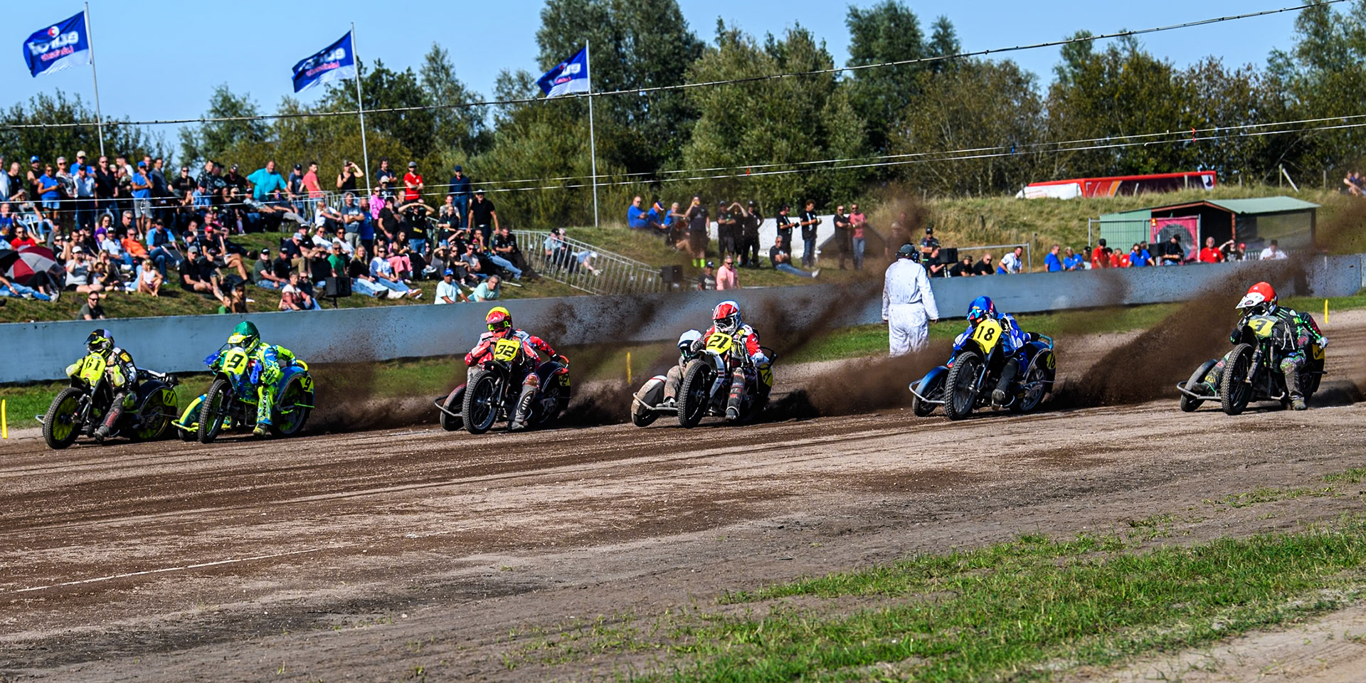 (L to R) \Joachim Martens &amp; Des Vanzonhoven (61) of Belgium in Black &amp; White, Mitch Goddard &amp; Paul Smith (9) of Great Britain in Green , Clement &amp; Romain Furet (32) of France in Yellow, Jérémy Malpeyre &amp; Dylan Bouillard (21) of France in White, Kenny Van Eeckhout &amp; Axelle Cannaerts (18) of Belgium and Josh &amp; Scott Goodwin (3) of Great Britain  in Red leave the start in the Sidecar Support Class during the FIM Long Track World Championship Final 5 at the Speed Centre Roden, Roden, Netherlands on Sunday 22nd September 2024. (Photo: Ian Charles | MI News)