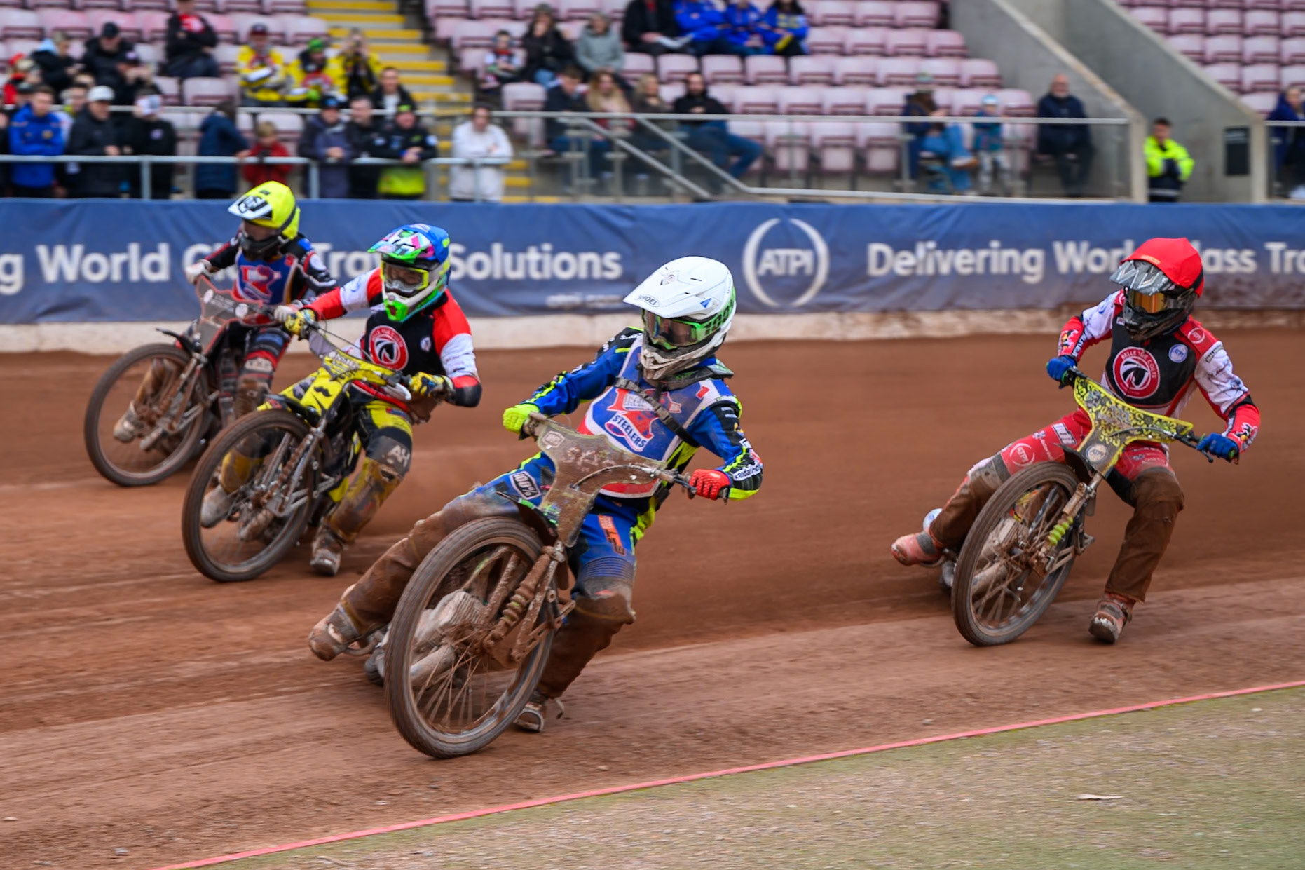 Steelers' Luke Harrison in White leading Belle Vue Colts' Guest Rider Dayle Wood in Blue Steelers' Ben Morley in Yellow and Belle Vue Colts' William Cairns in Red during the WSRA National Development League match between Belle Vue Colts and Sheffield/Scunthorpe Steelers at the National Speedway Stadium, Manchester on Sunday 12th October 2025. (Photo: Ian Charles | MI News)