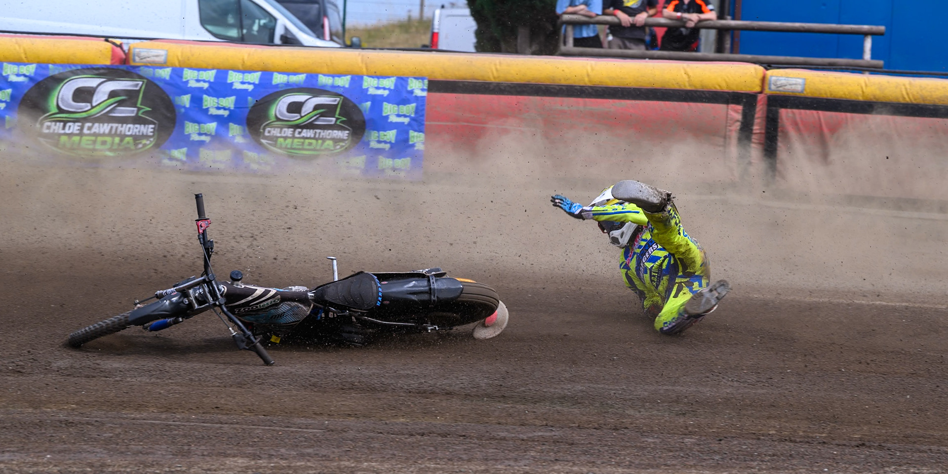 Harry Fletcher of Oxford Chargers in Yellow  falls during the WSRA National Development League match between Buxton Bulls and Oxford Chargers at Hi-Edge Speedway, Buxton on Sunday 2nd August 2026. (Photo: Ian Charles | MI News)