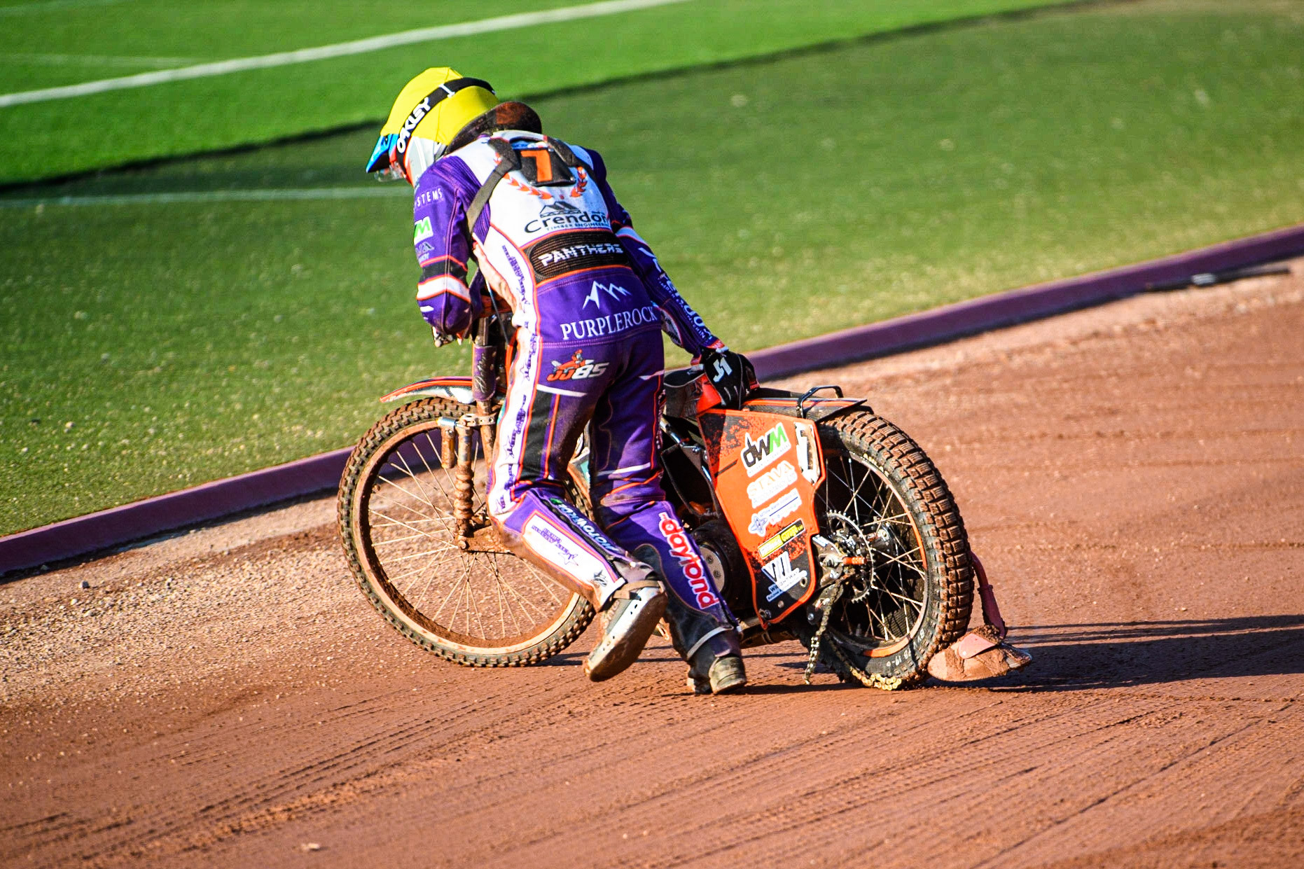 Jordan Jenkins pulls his bike from the track after shedding his chain and jamming the back wheel during the Sports Insure Premiership match between Belle Vue Aces and Peterborough at the National Speedway Stadium, Manchester on Monday 19th June 2023. (Photo: Ian Charles | MI News)