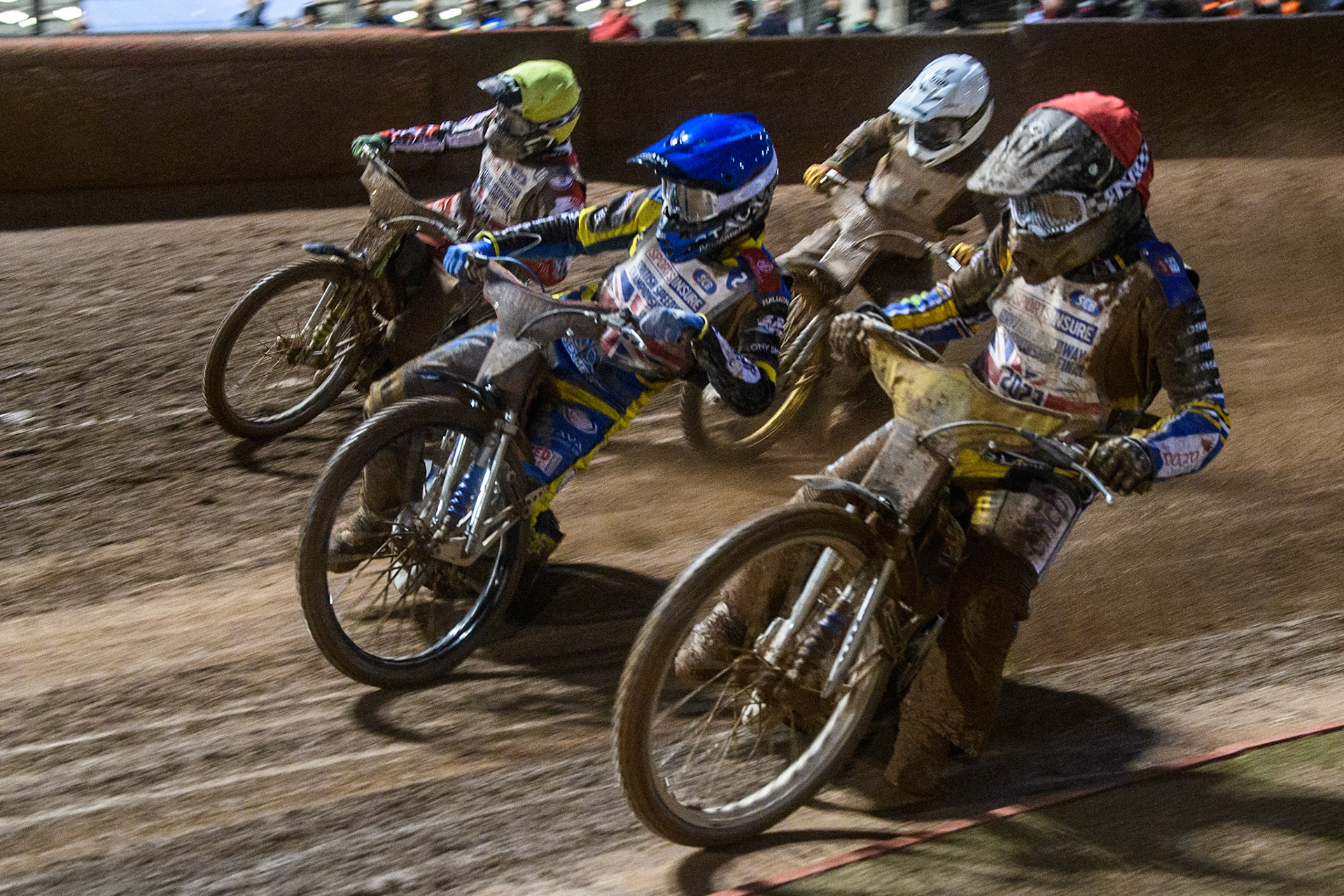 Ben Barker (Red) inside Adam Ellis (Blue) and Charles Wright  (Yellow) with Connor Mountain (White) behind during the Sports Insure British Speedway Final at the National Speedway Stadium, Manchester on Monday 14th August 2023. (Photo: Ian Charles | MI News)