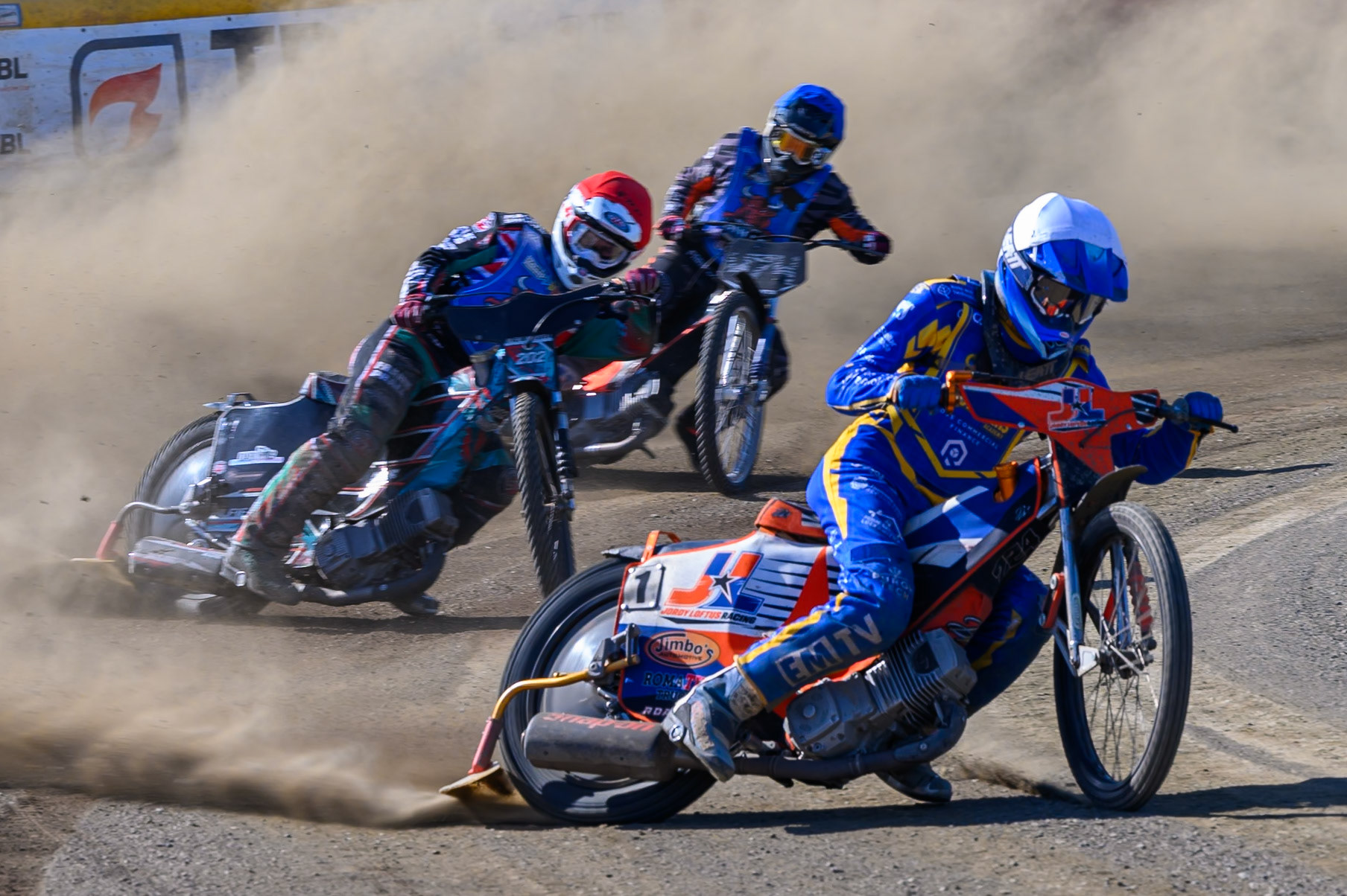 Jordy Loftus of Edinburgh Monarchs Academy in White leading Alfie Bowtell of Buxton Bulls in Red and Jack Roberts of Buxton Bulls in Blue during the WSRA National Development League match between Buxton Bulls and Edinburgh Monarchs Academy at Hi-Edge Speedway, Buxton on Sunday 14th June 2026. (Photo: Ian Charles | MI News)