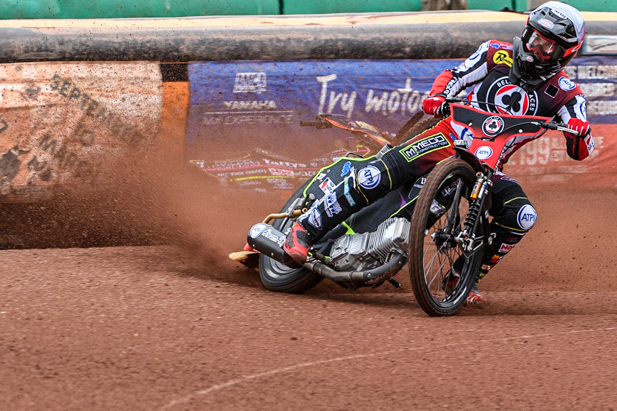 Tom Brennan (White) inside Leon Flint (Blue) as he falls in the first bend during the Sports Insure Premiership match between Wolverhampton Wolves and Belle Vue Aces at Monmore Green Stadium, Wolverhampton on Monday 10th July 2023. (Photo: Ian Charles | MI News)