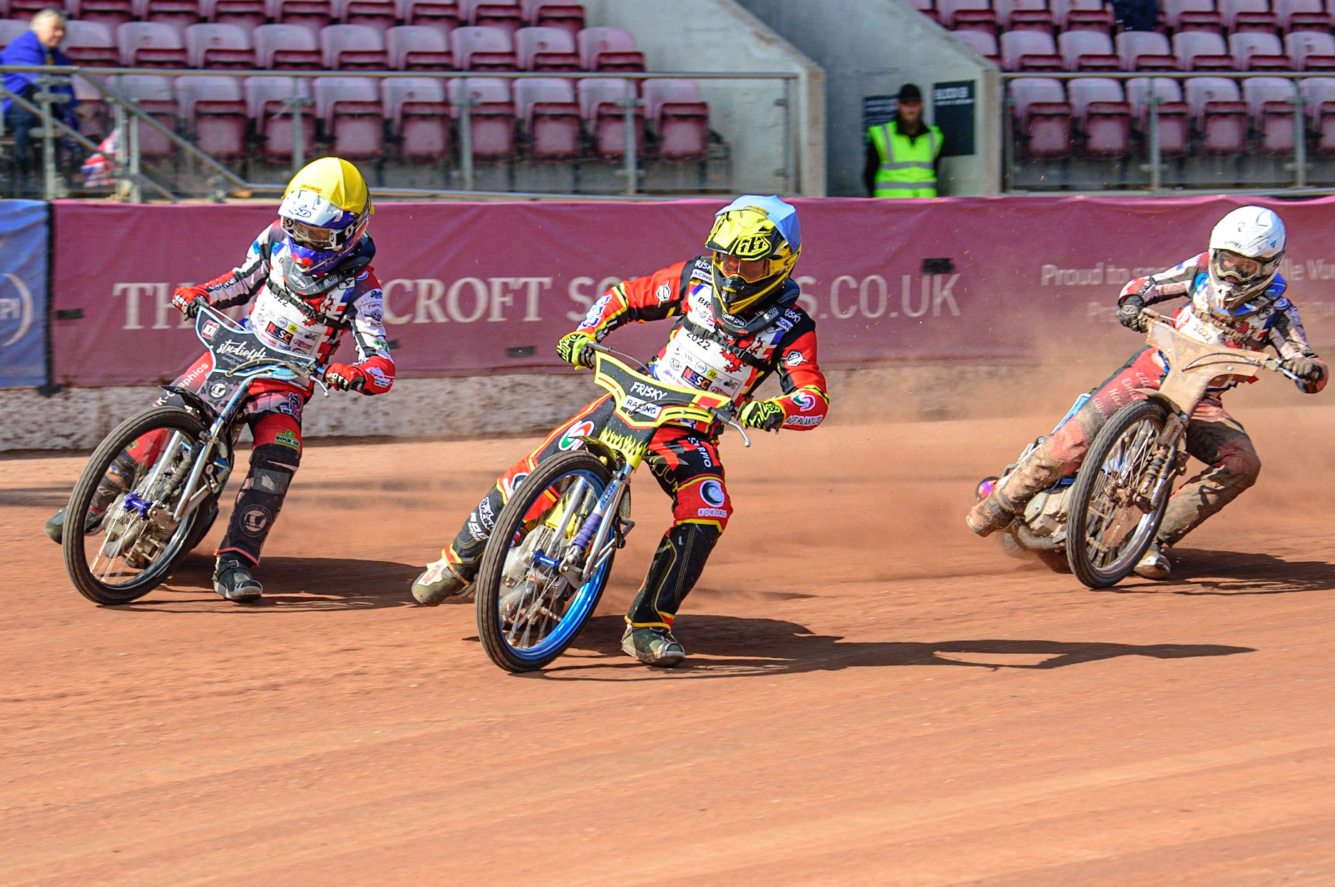 MANCHESTER, UK. JUN 3RD Max James (54) (Blue) inside Freddy Hodder (44)  (Yellow) with Sam McGurk (116) (White) behind during the British Youth Speedway Championship (Round 4)  at the National Speedway Stadium, Manchester on Friday 3rd June 2022. (Credit: Ian Charles | MI News)