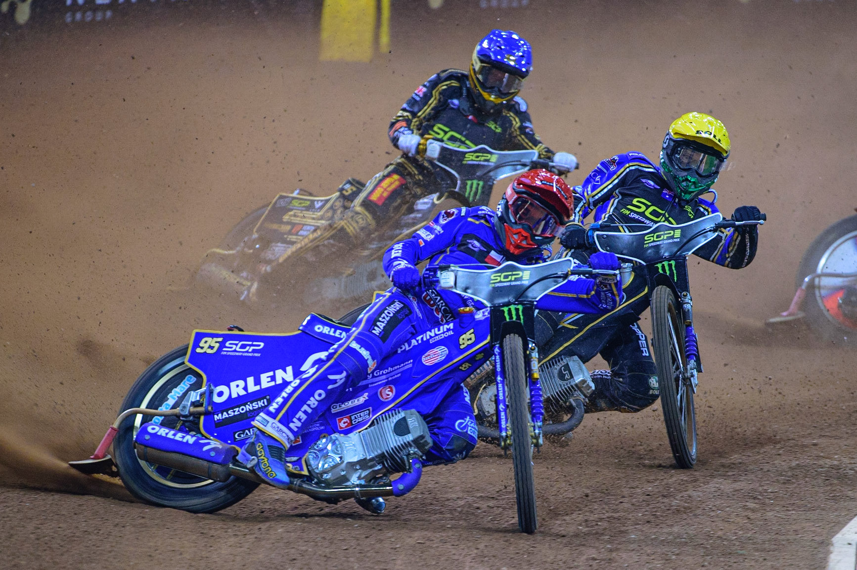 Bartosz Zmarzlik (95) (Red) leads Jason Doyle (69) (Yellow) and Anders Thomsen (105)] (Blue) during the FIM  Speedway Grand Prix of Great Britain at the Principality Stadium, Cardiff on Saturday 13th August 2022. (Credit: Ian Charles | MI News