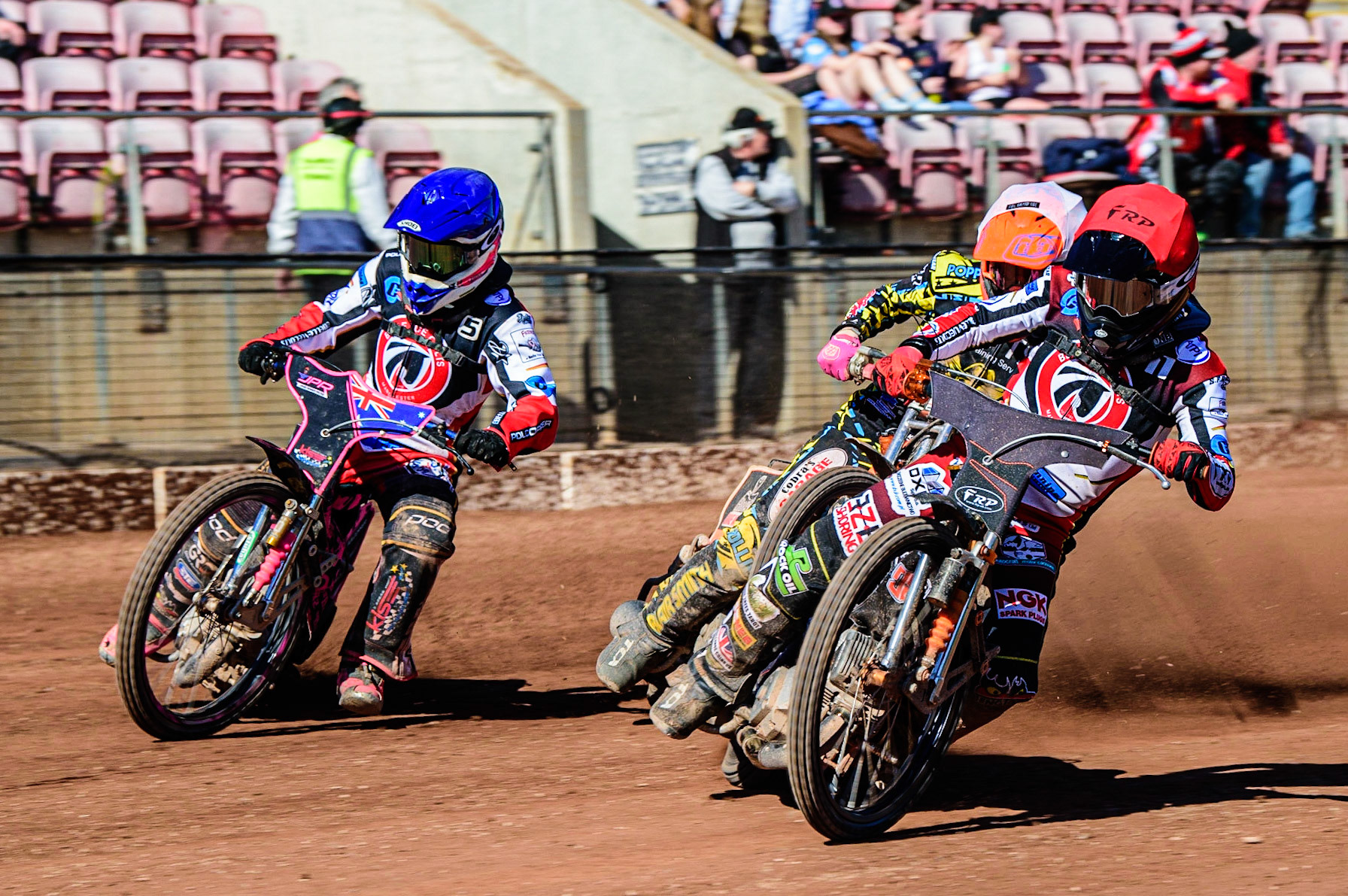 Jack Smith  (Red) and James Pearson   (Blue) lead Connor Coles  (White) during the National Development League match between Belle Vue Colts and Berwick Bullets at the National Speedway Stadium, Manchester on Friday 7th April 2023. (Photo: Ian Charles | MI News)