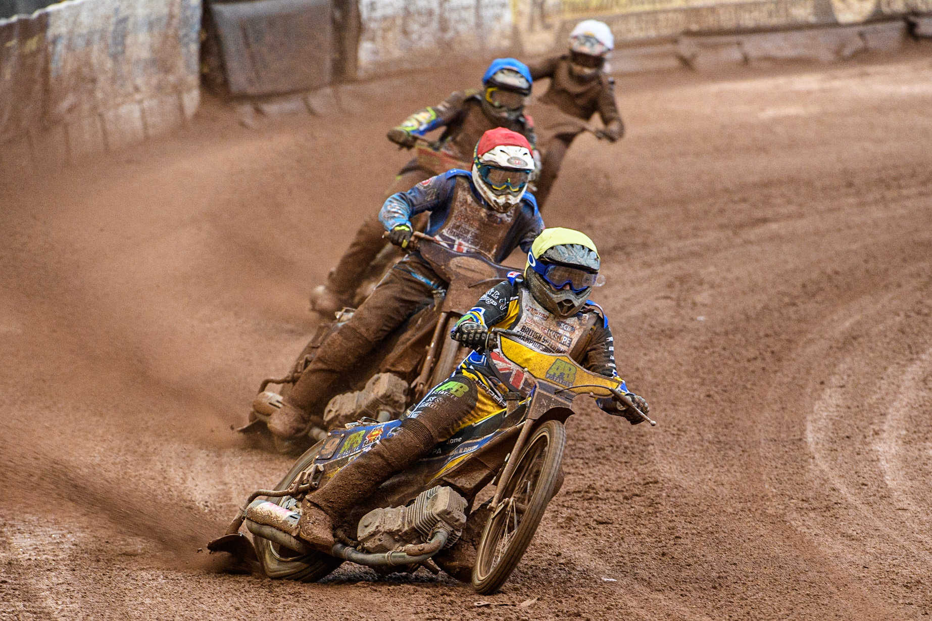 Ben Barker (Yellow) leads Richard Lawson (Red) Simon Lambert (Blue) and Sam Hagon (White) during the Sports Insure British Speedway Final at the National Speedway Stadium, Manchester on Monday 14th August 2023. (Photo: Ian Charles | MI News)