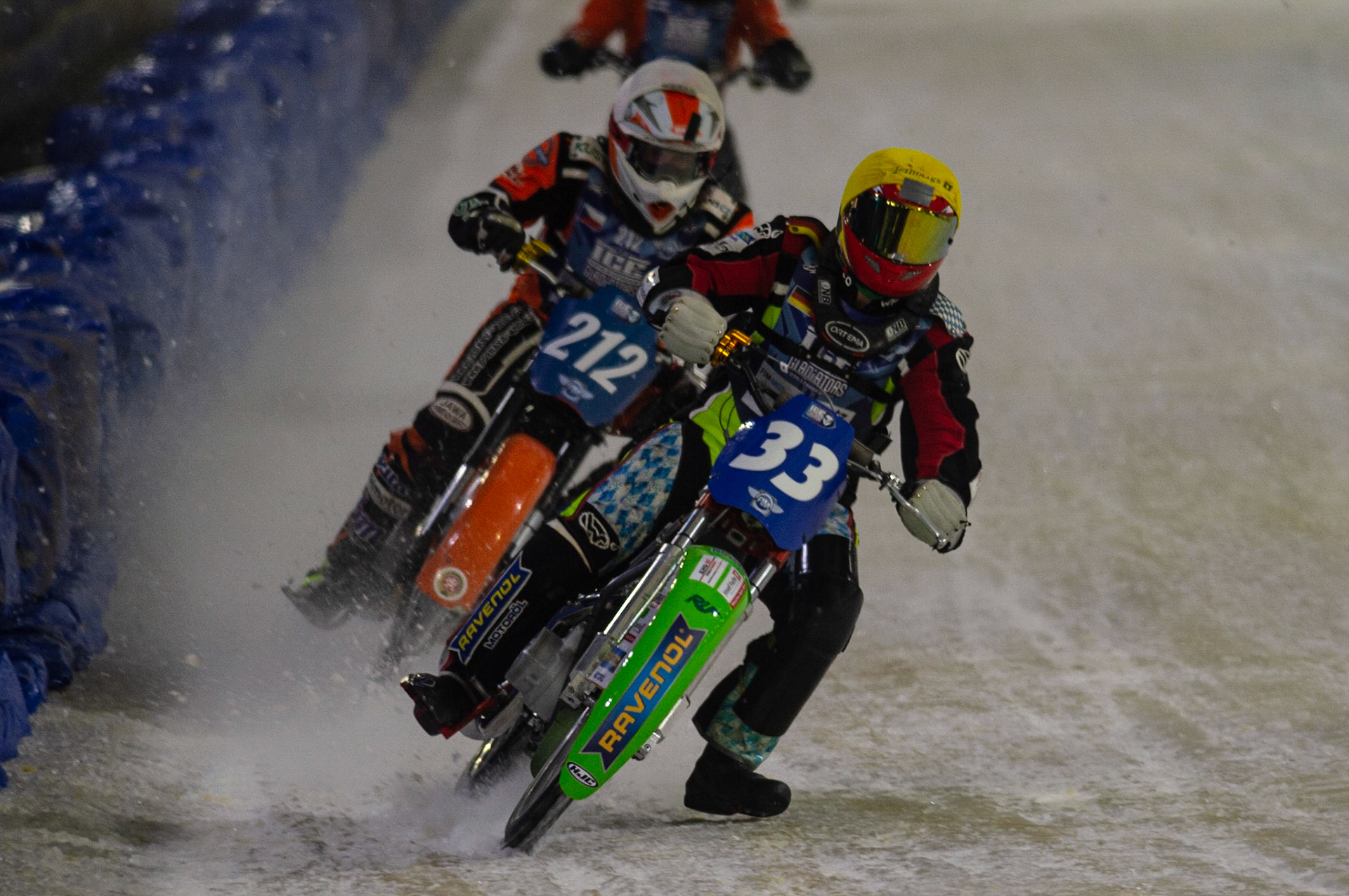 HEERENVEEN, NL.Johann Weber (33)  (Yellow) leads Lukas Hutla (212) (White)  during the FIM Ice Speedway Gladiators World Championship Final 3 at Ice Rink Thialf, Heerenveen on Saturday  2 April 2022. (Credit: Ian Charles | MI News)