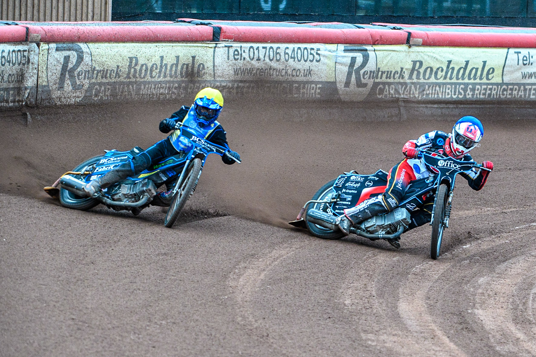 Freddy Hodder (Blue) inside Ashton Boughen (Yellow) during the National Development League match between Belle Vue Colts and Edinburgh Monarchs Academy at the National Speedway Stadium, Manchester on Friday 21st July 2023. (Photo: Ian Charles | MI News)