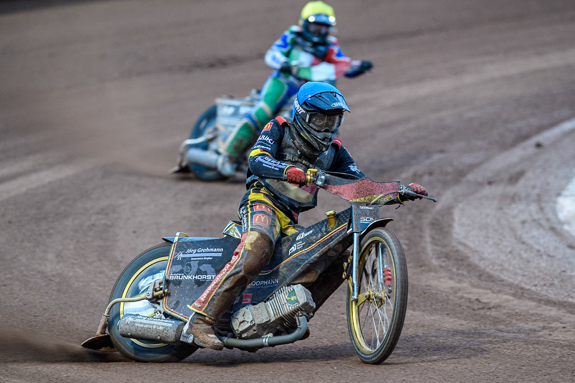 Norick Blödorn of Germany in Blue leading Nicolas Covatti of Italy in Yellow during the Monster Energy FIM Speedway of Nations Semi-Final 1 at the National Speedway Stadium, Manchester on Tuesday 9th July 2024. (Photo: Ian Charles | MI News)