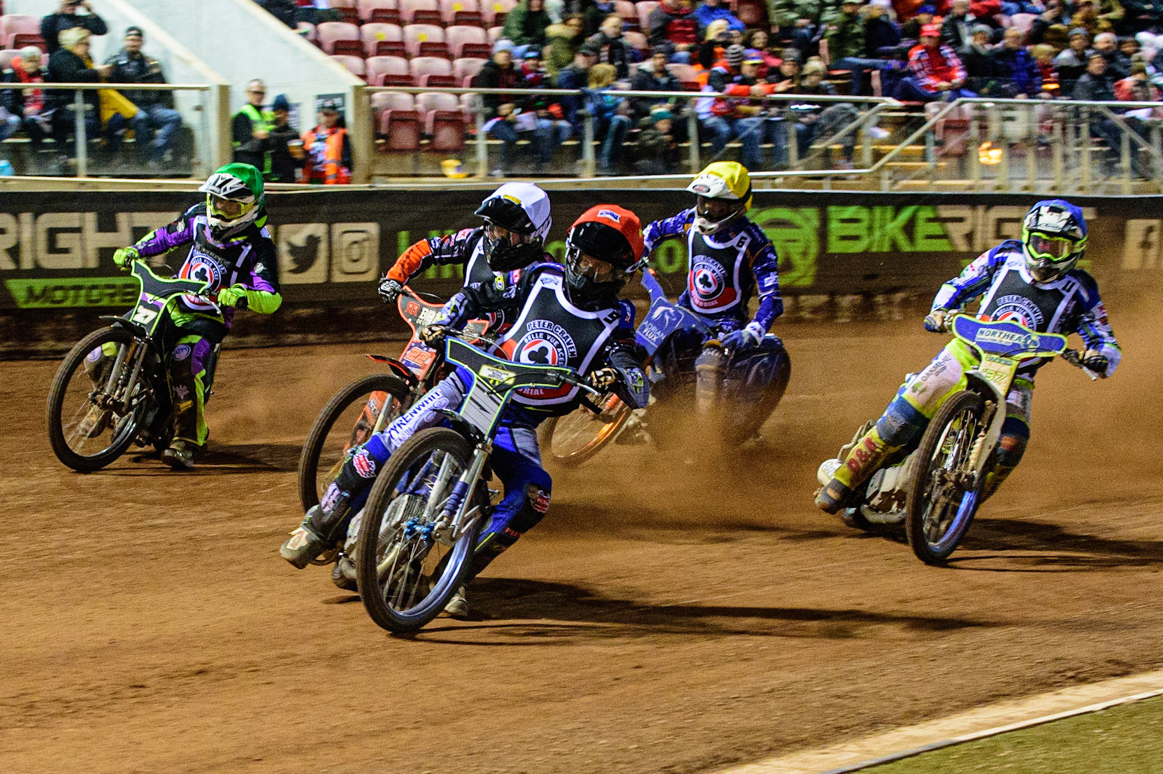MANCHESTER, UK. OCT 23RD  The five rider last chance race as Ryan Douglas  (Red) leads Luke Becker  (White) Tom Brennan  (Green) Lewis Kerr (Yellow) and Chris Harris  (Blue) during the Peter Craven Memorial Trophy event at the National Speedway Stadium, Manchester on Saturday 23rd October 2021. (Credit: Ian Charles | MI News)