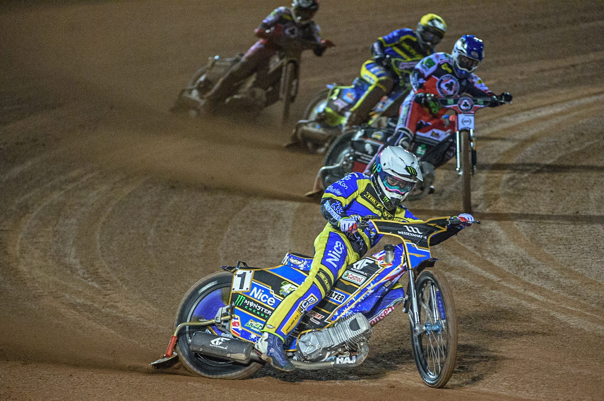 MANCHESTER, UK. OCT 7TH  Jack Holder  (White) leads Richie Worrall  (Blue) Troy Batchelor  (Yellow) and Dan Bewley  (Red) during the SGB Premiership Play off Semi-Final Second Leg between Belle Vue Aces and Sheffield Tigers at the National Speedway Stadium, Manchester on Thursday 7th October 2021. (Credit: Ian Charles | MI News)