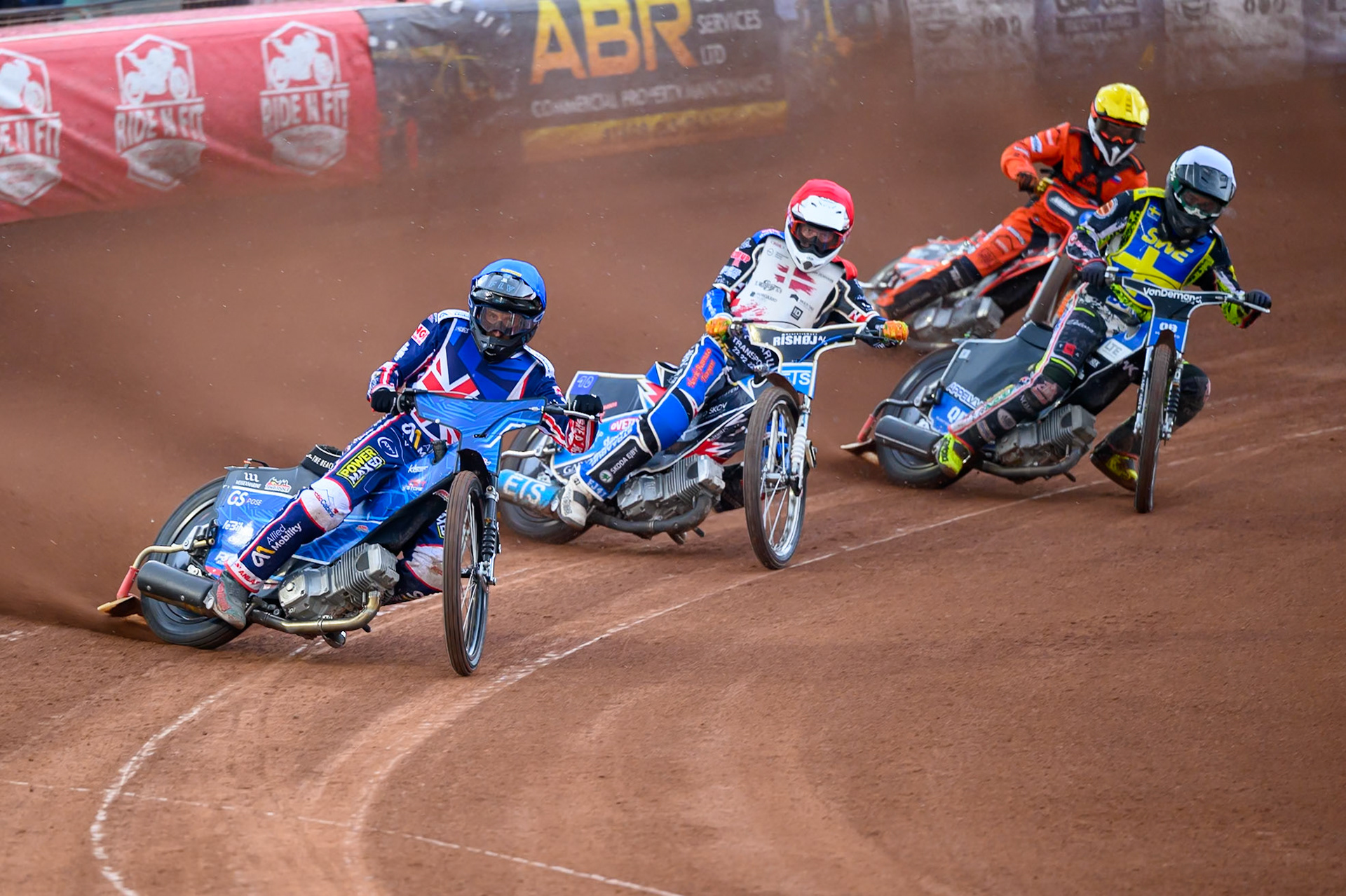 Frederik Jacobsen of Denmark in Blue leading Frederik Jacobsen of Denmark in Red Casper Henriksson of Sweden in White and Sven Cerjak of Slovenia in Yellow during the Speedway GP Qualifying Round 3 at Allied Ashfield Stadium, Glasgow on Saturday 30th May 2026. (Photo: Ian Charles | MI News)