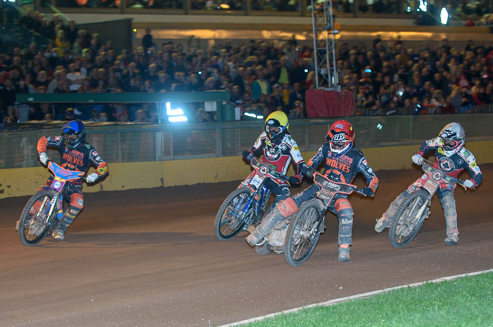 WOLVERHAMPTON, UK. AUGUST 30TH. Sam Masters  (Red) and Rory Schlein  (Blue) lead Dan Bewley  (White) and Brady Kurtz  (Yellow) during the SGB Premiership match between Wolverhampton Wolves and Belle Vue Aces at Monmore Green Stadium, Wolverhampton on Monday 30th August 2021. (Credit: Ian Charles | MI News)