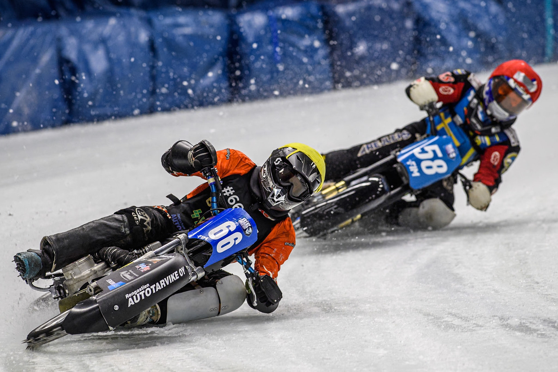 Finland's Aki Ala-Riihimäki (66) (Yellow) leads  Sweden's Stefan Svensson (58) (Red) during the FIM Ice Speedway Gladiators World Championship Final 1 at the Max-Aicher-Arena, Inzell on Saturday 23 March 2024. (Photo: Ian Charles | MI News)