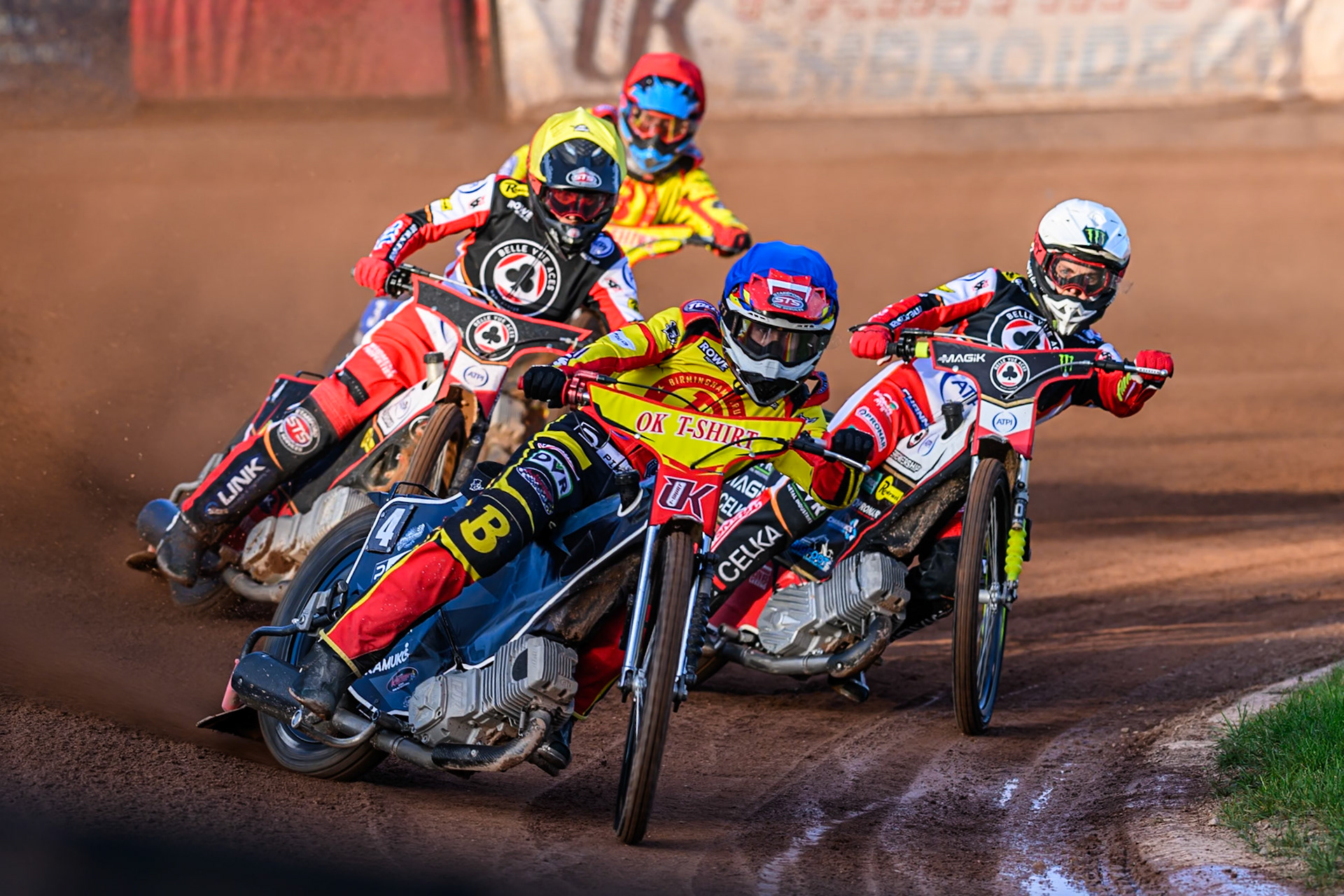 Birmingham Brummies' Keynan Rew  in Blue leading Belle Vue Aces' Zach Cook  in Yellow, Belle Vue Aces' Jaimon Lidsey in White and Birmingham Brummies' Jonas Jeppesen  in Red during the Rowe Motor Oil Premiership match between Birmingham Brummies and Belle Vue Aces at Perry Barr Stadium, Birmingham on Monday 28th July 2025. (Photo: Ian Charles | MI News)