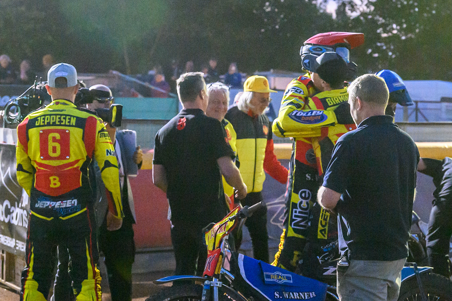 Birmingham Brummies riders and staff celebrate their match win during the Rowe Motor Oil Premiership match between Birmingham Brummies and Belle Vue Aces at Perry Bar Stadium, Birmingham on Monday 2nd June 2025. (Photo: Ian Charles | MI News)