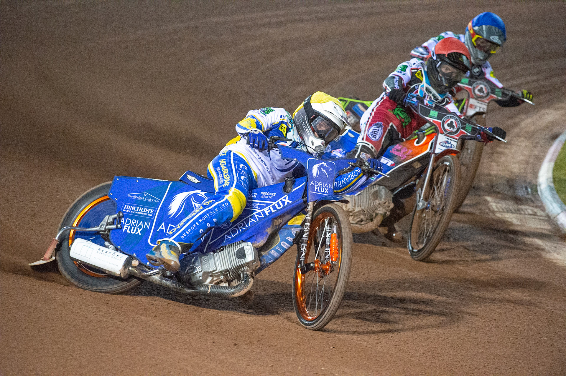 Photo: Ian CharlesLewis Kerr of the 'ATPI' All Stars (Yellow) takes the lead from Brady Kurtz of Belle Vue 'BikeRight' Aces (Red) and Jye Etheridge of Belle Vue 'BikeRight' Aces  (Blue)Belle Vue ‘Bikerite ’Aces v ‘ATPI’ All Stars, Premiership Challenge, National Speedway Stadium, Manchester Thursday  24  September  2020