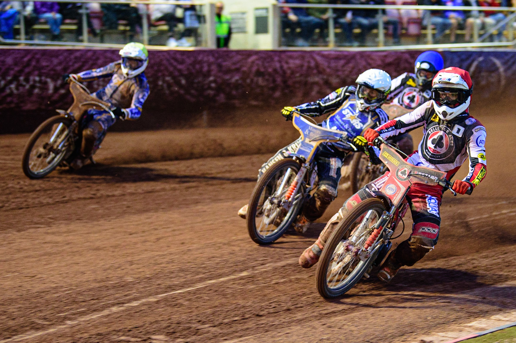 MANCHESTER, UK. MAY 16TH Max Fricke  (Red) leads Niels-Kristian Iversen  (White) and Josh Pickering  (Yellow) with Brady Kurtz  (Blue) behind during the SGB Premiership match between Belle Vue Aces and King's Lynn Stars at the National Speedway Stadium, Manchester on Monday 16th May 2022. (Credit: Ian Charles | MI News)