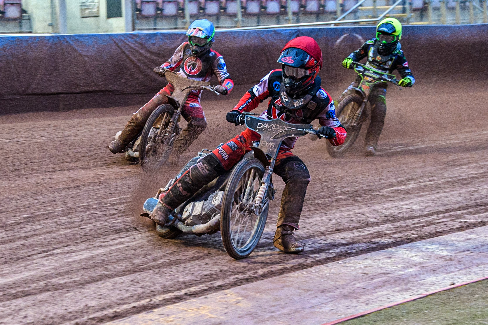 Belle Vue Colts' Freddy Hodder in Red leading Belle Vue Colts' William Cairns in Blue and Oxford Chargers' Max Perry  in Yellow during the WSRA National Development League match between Belle Vue Colts and Oxford Chargers at the National Speedway Stadium, Manchester on Friday 2nd August 2024. (Photo: Ian Charles | MI News)