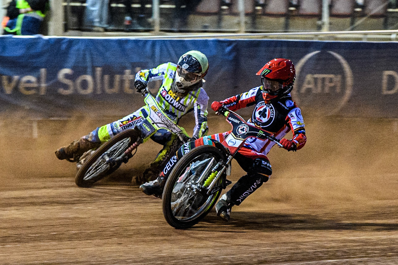 Belle Vue Aces' Jaimon Lidsey in Red rides inside Oxford Spires' Francis Gusts in Yellow during the Rowe Motor Oil Premiership match between Belle Vue Aces and Oxford Spires at the National Speedway Stadium, Manchester on Monday 14th April 2025. (Photo: Ian Charles | MI News)